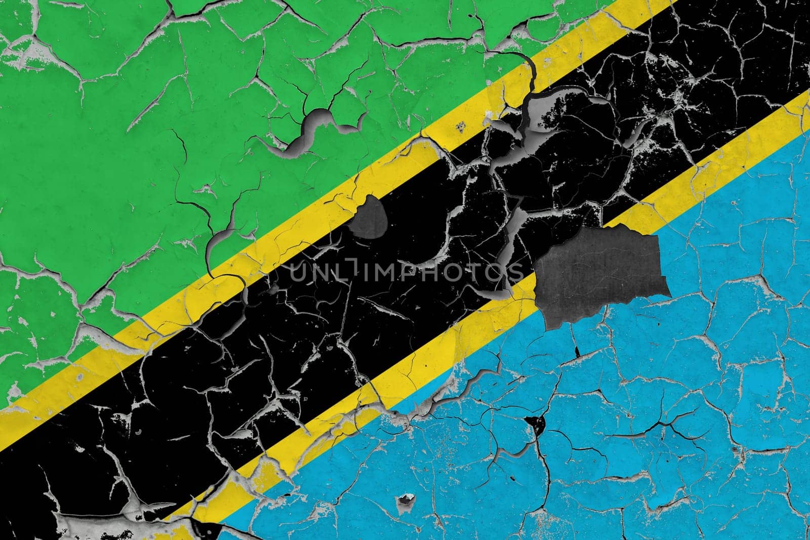 3D Flag of Tanzania on an old stone wall background.