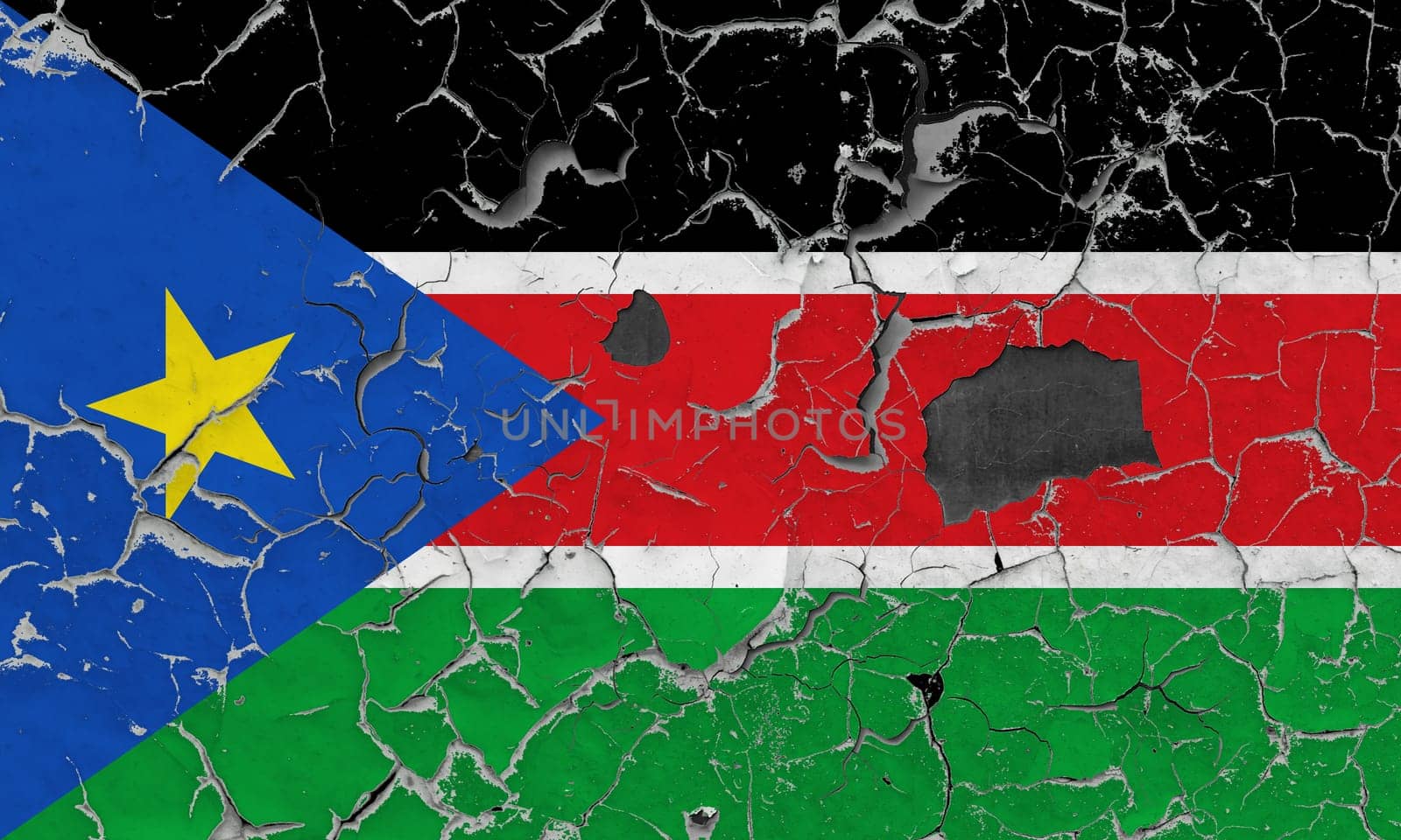 3D Flag of South Sudan on an old stone wall background.