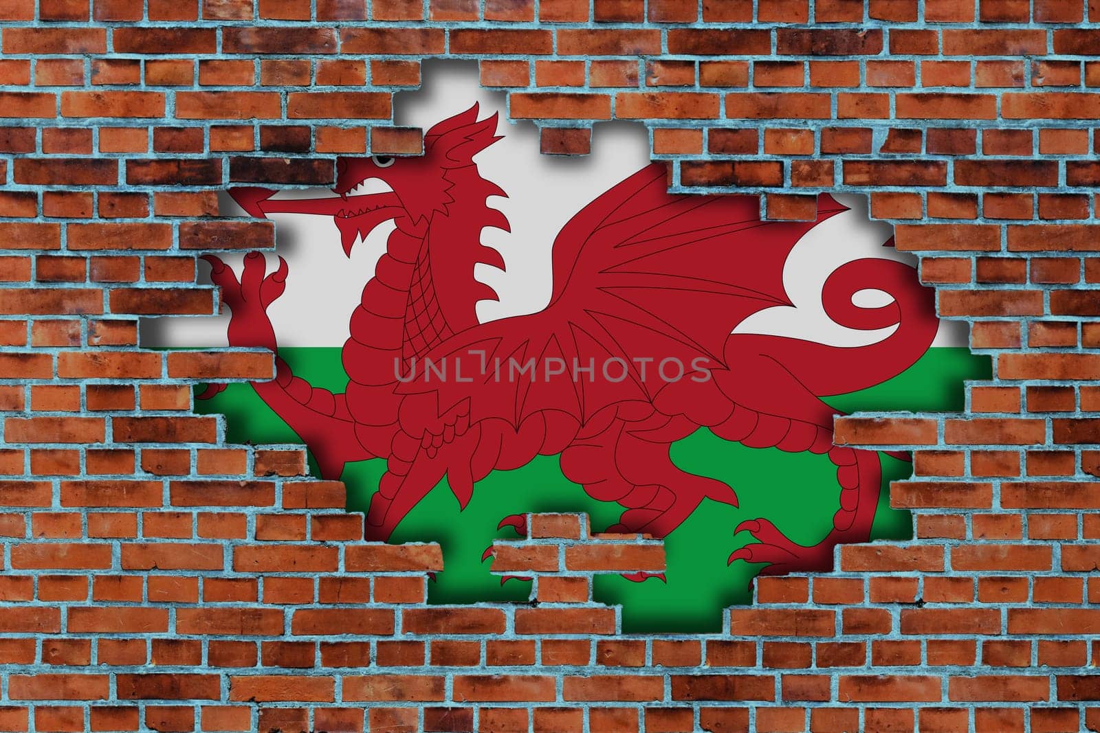 3D Flag of Wales behind the broken old stone wall background.