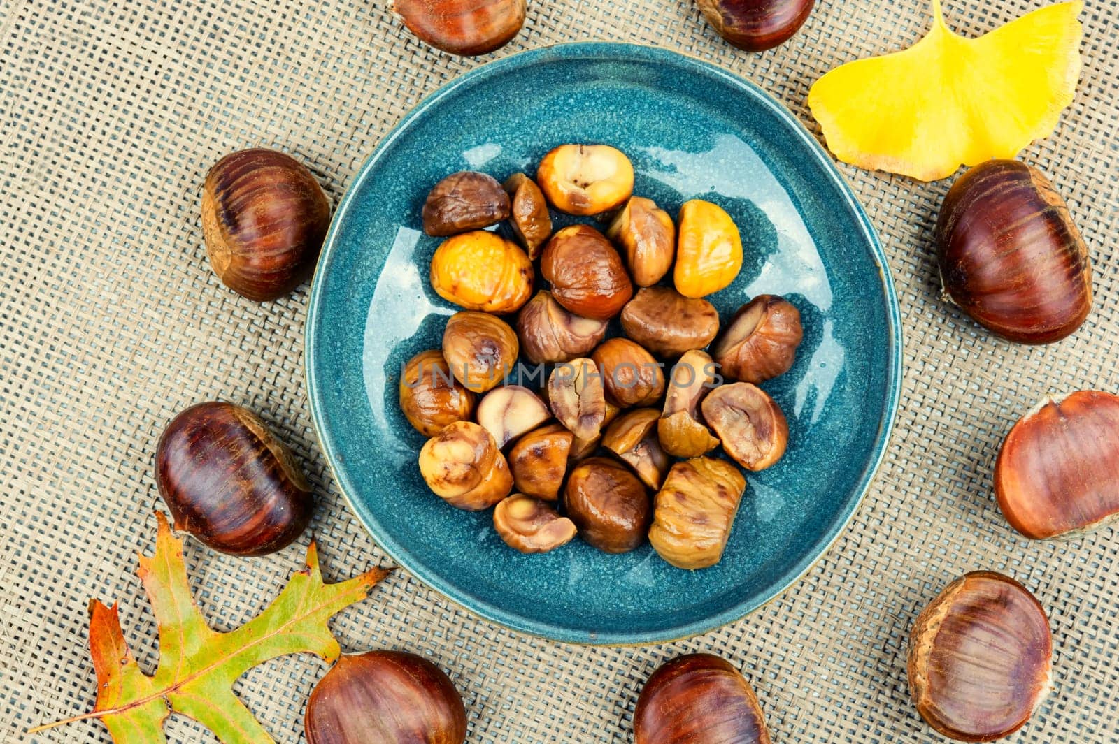 Peeled roasted chestnuts, appetizing dessert. Caramelized roasted chestnuts.Top view