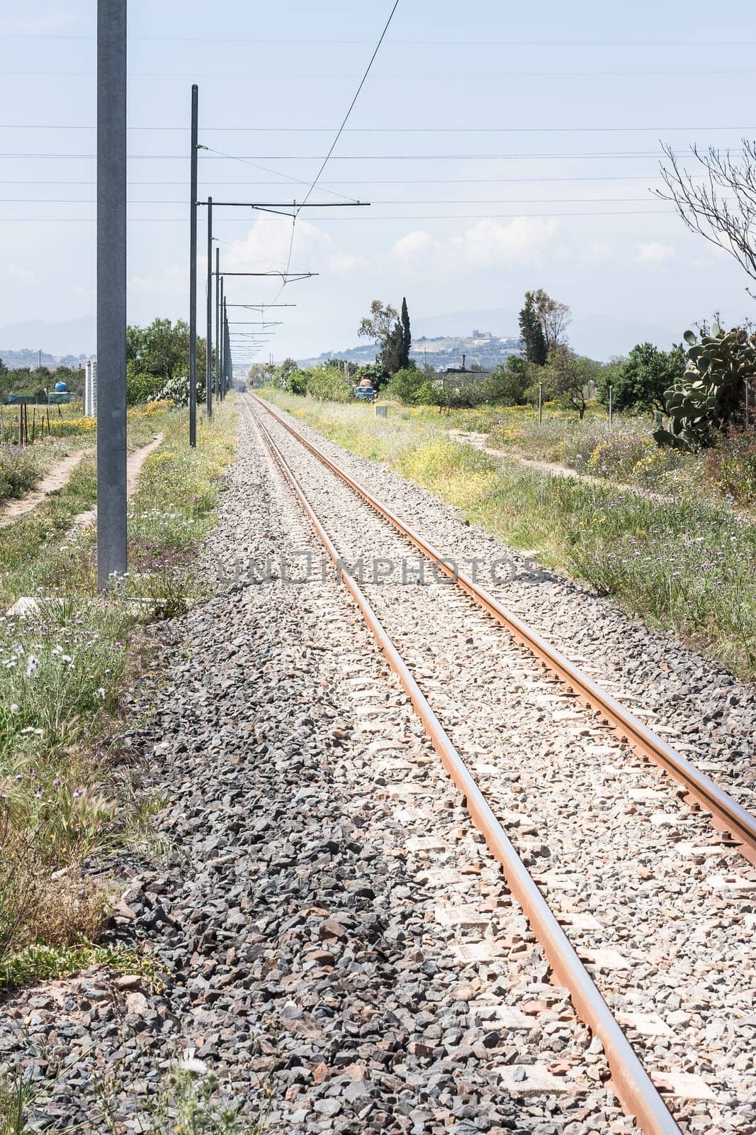 railroad tracks pylons countryside. Binary to  infinity