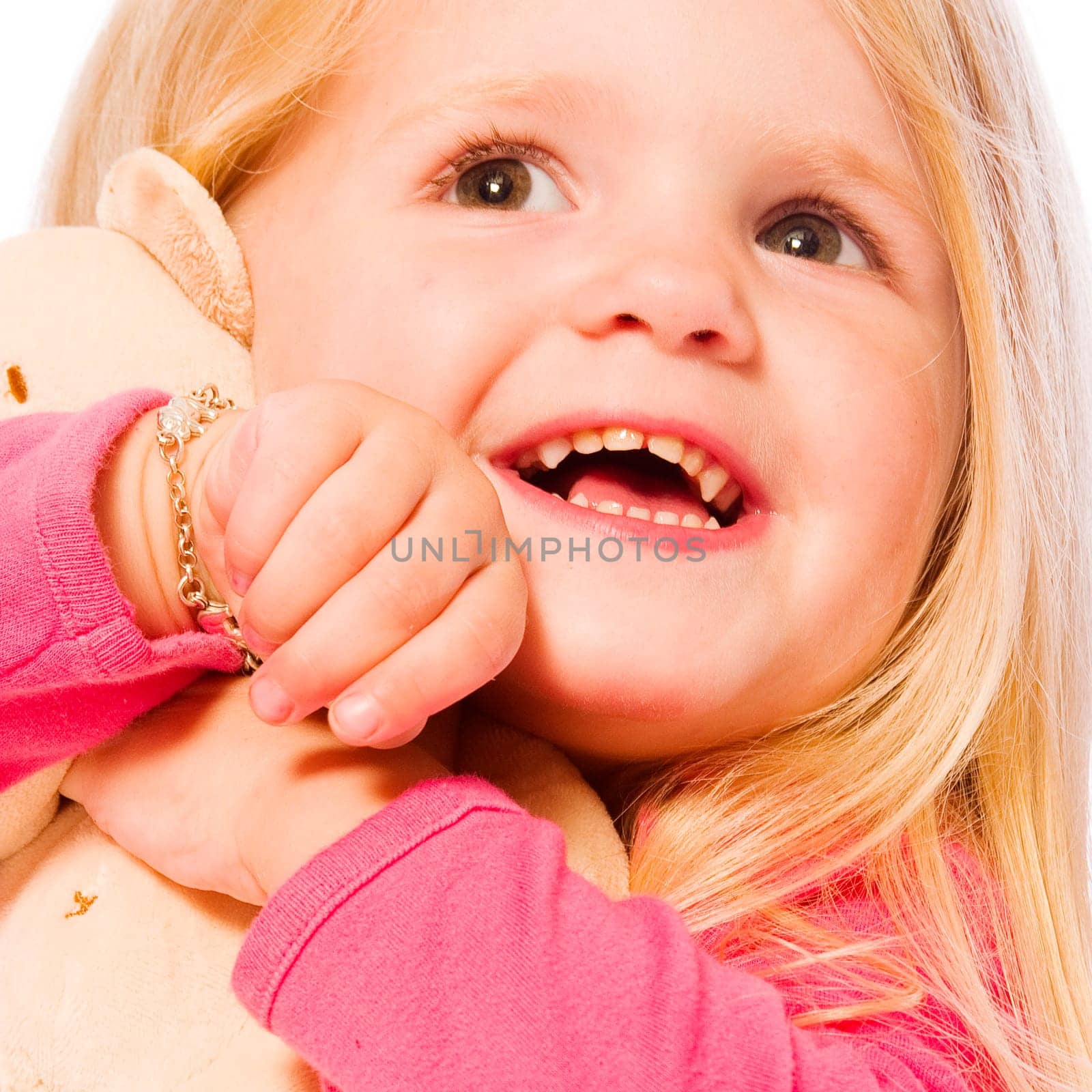 little children portraits taken in the studio on a white background