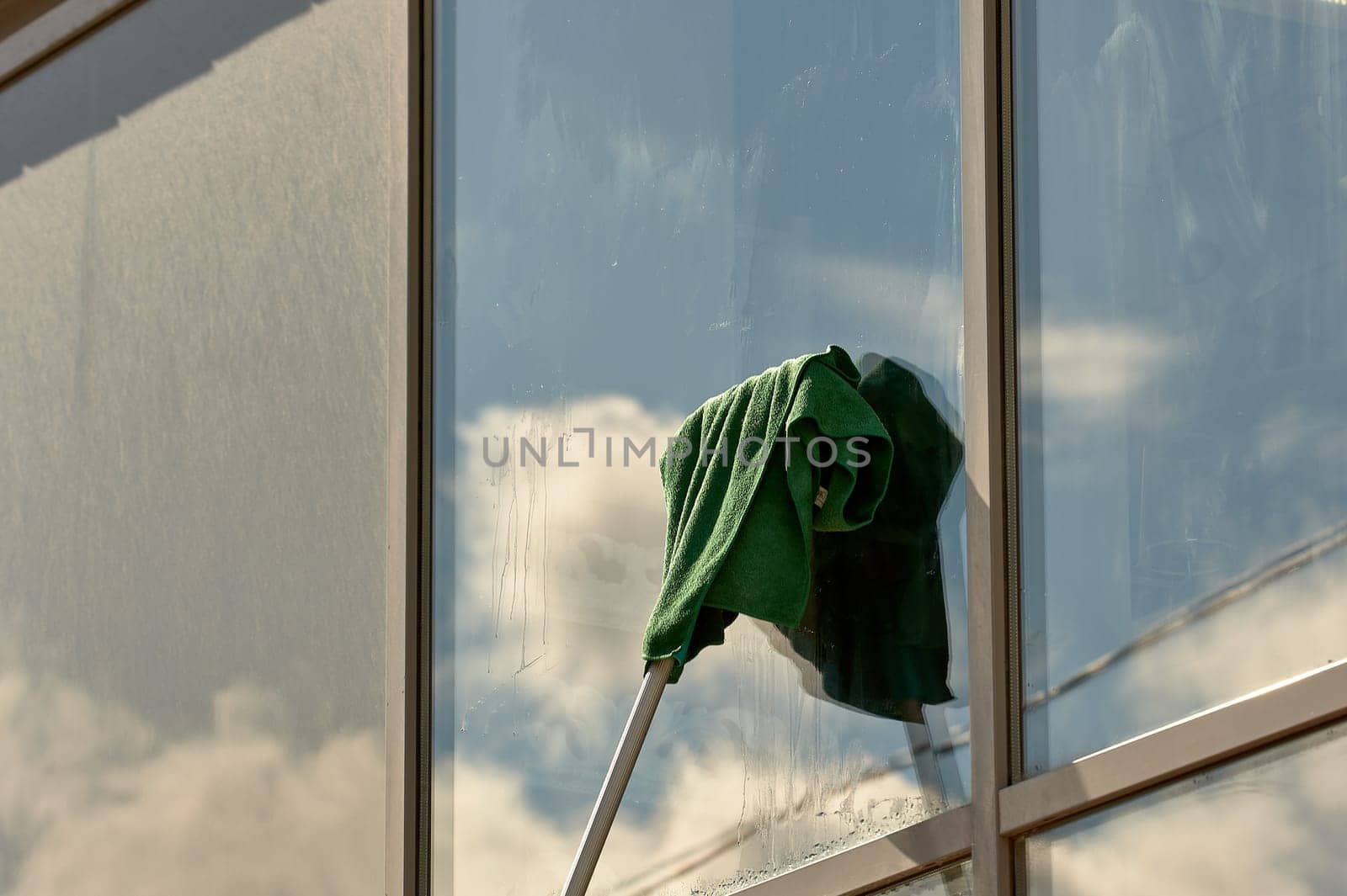 window washing, washing a street shop window. High quality photo