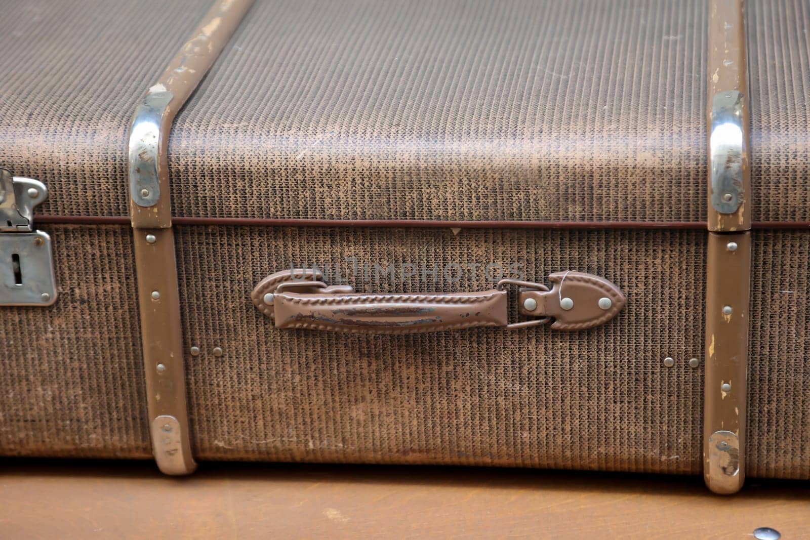 Details of an old suitcase as it was used 50 years ago.