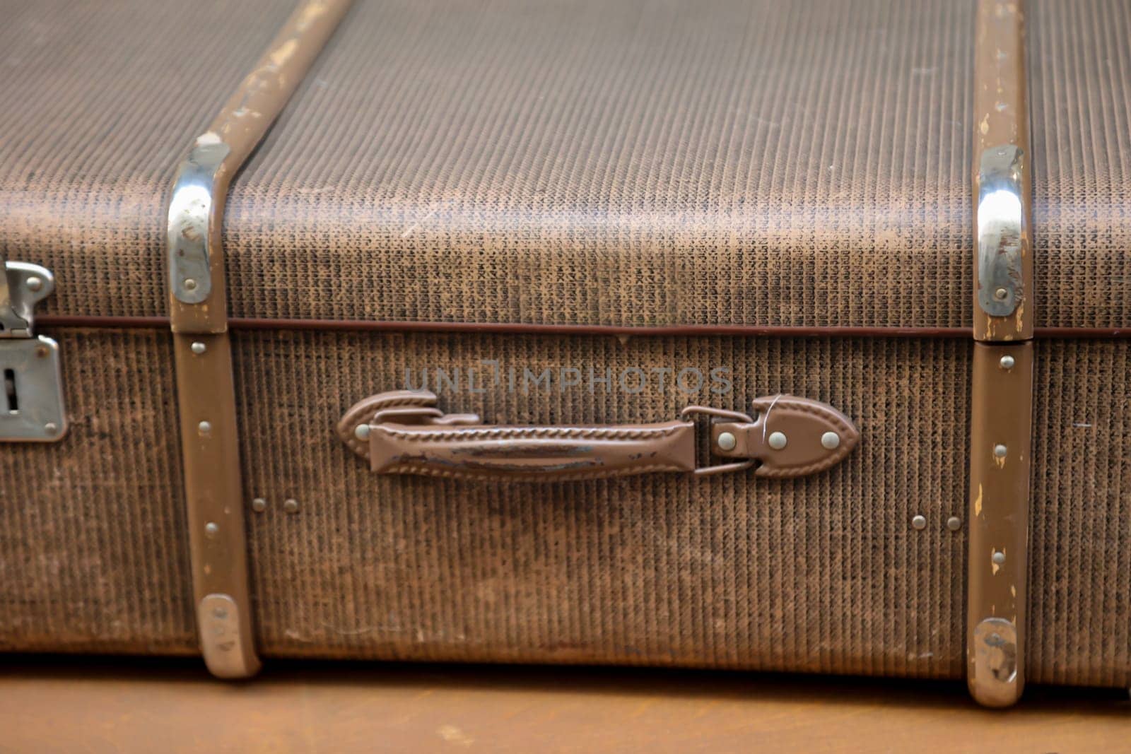 Details of an old suitcase as it was used 50 years ago.