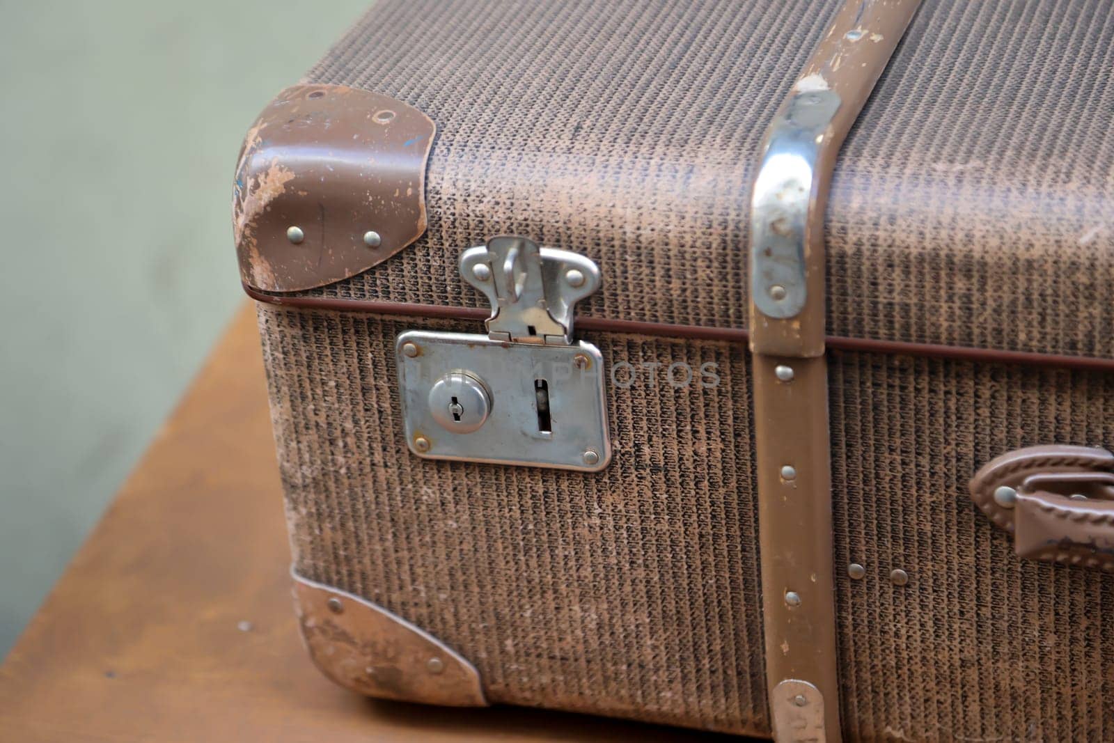 Details of an old suitcase as it was used 50 years ago.