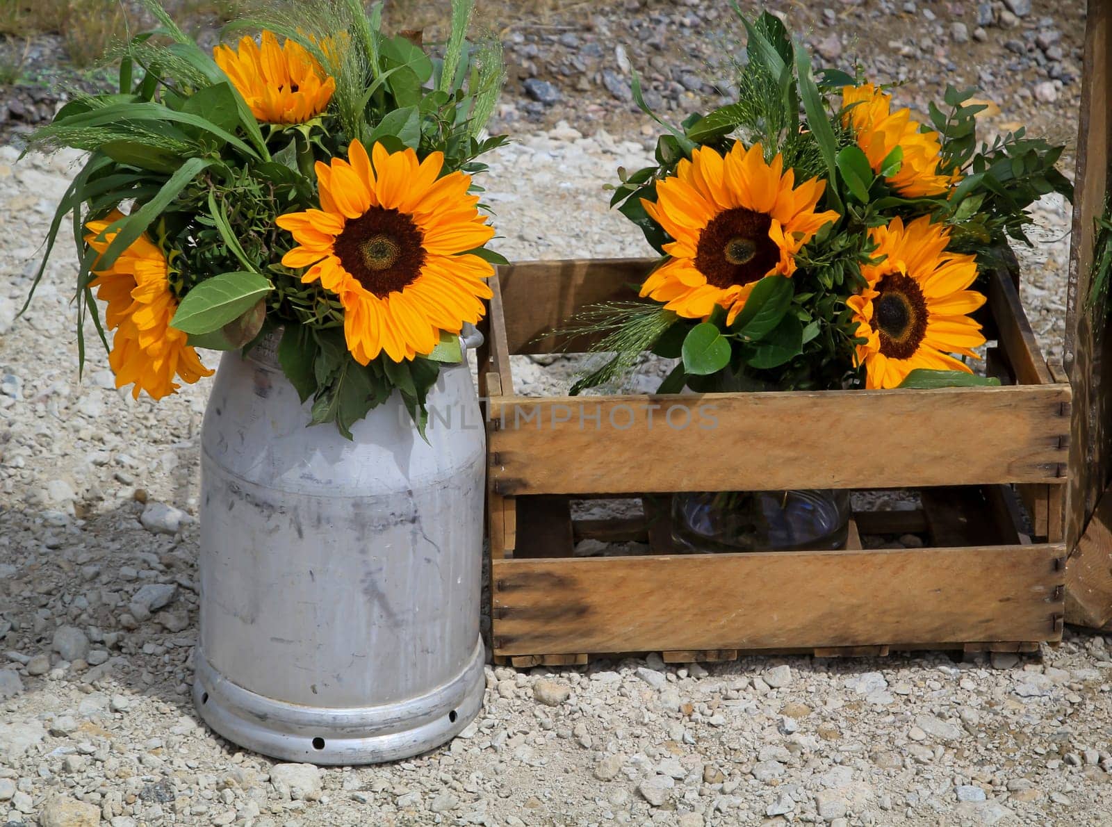 A festive decoration with beautiful yellow sunflowers.