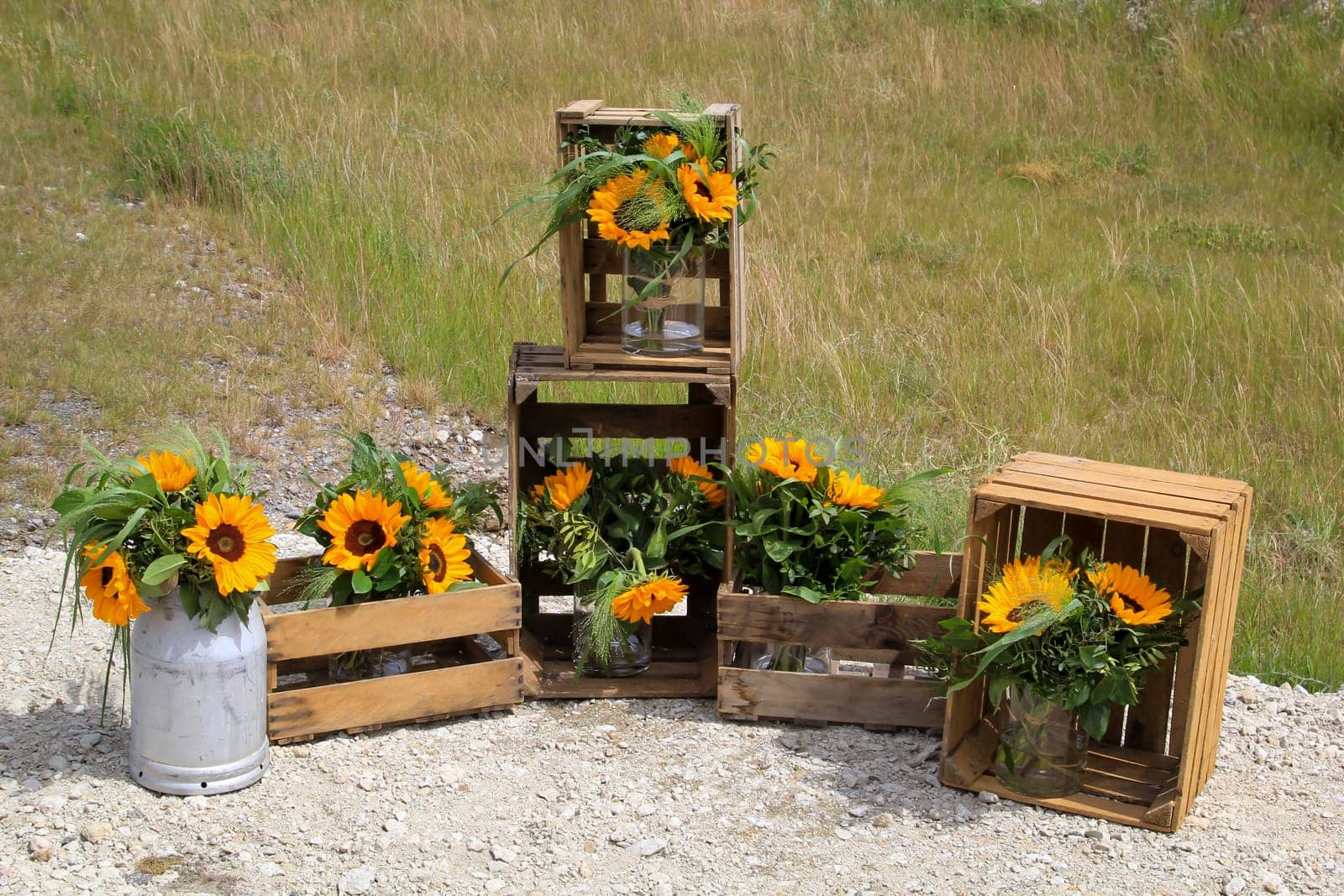 A festive decoration with beautiful yellow sunflowers.