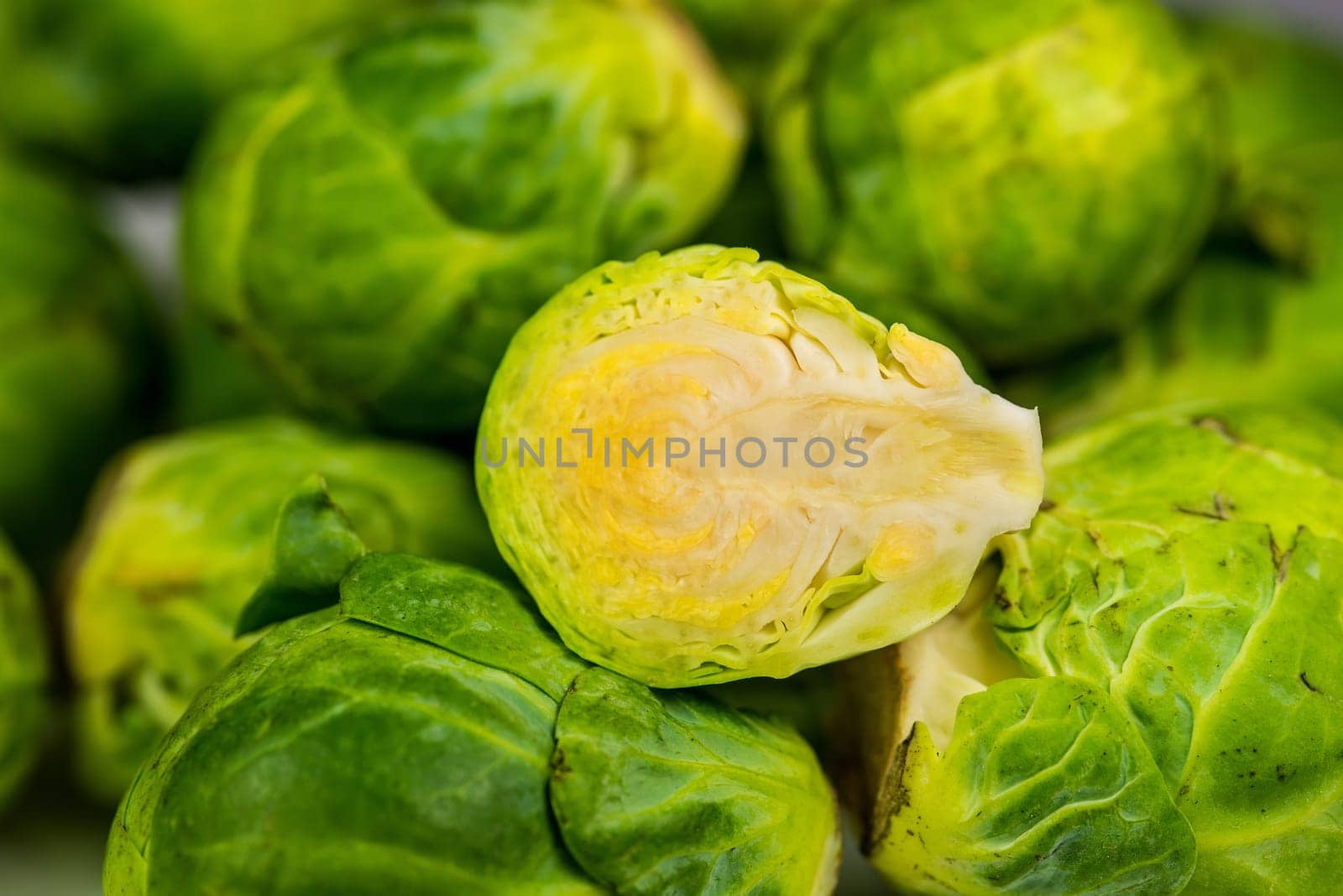 Brussels sprouts in a closeup with cut
