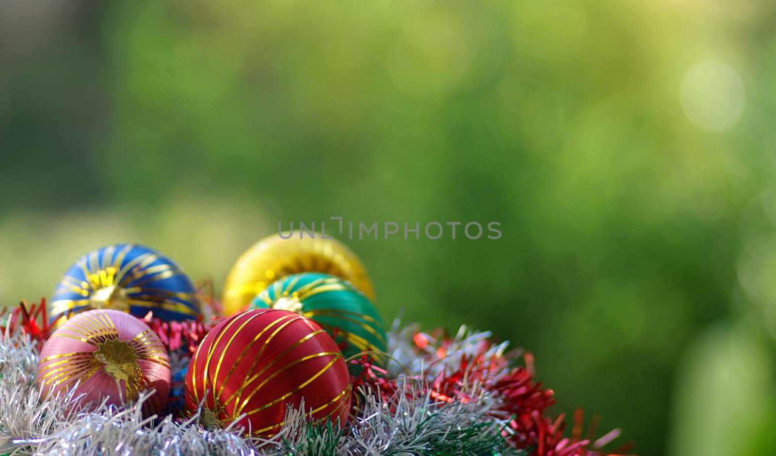 Colorful Christmas balls isolated for celebration .