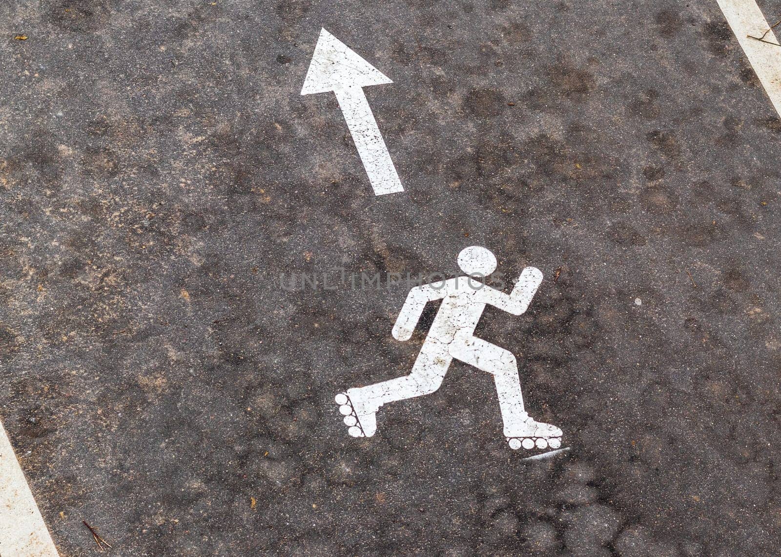 Shot of the paint marking on the asphalt indicating roller skating path