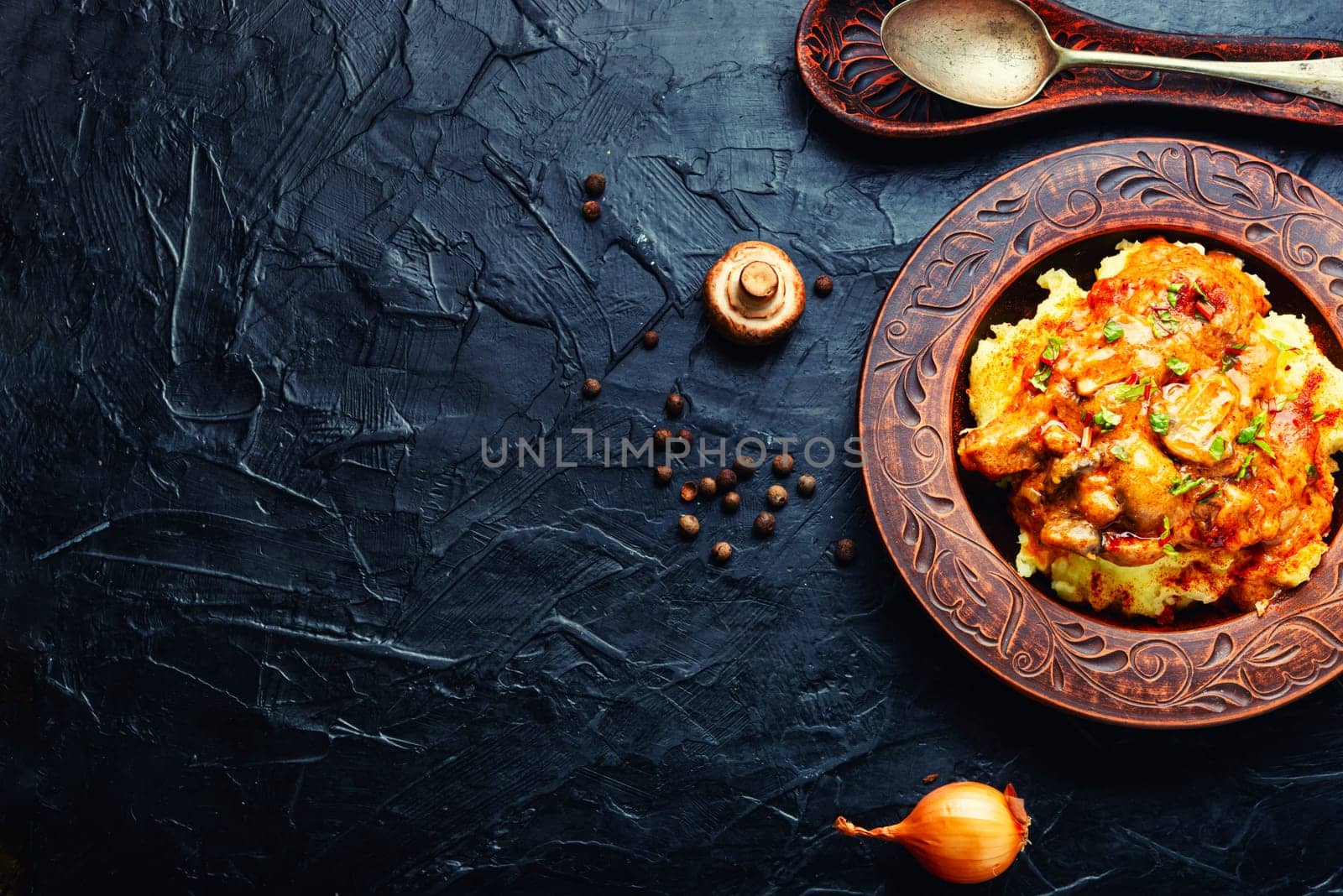 Beef meat stew in sauce with mashed potatoes. Space for text, recipe place