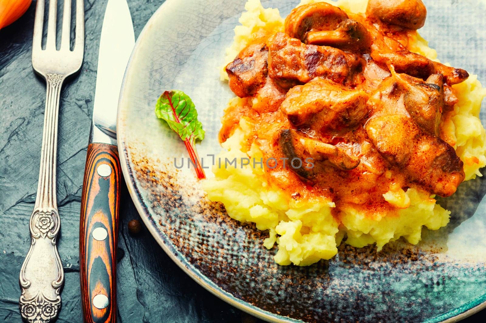 Beef meat stew in sauce with mashed potatoes. Space for text, recipe place