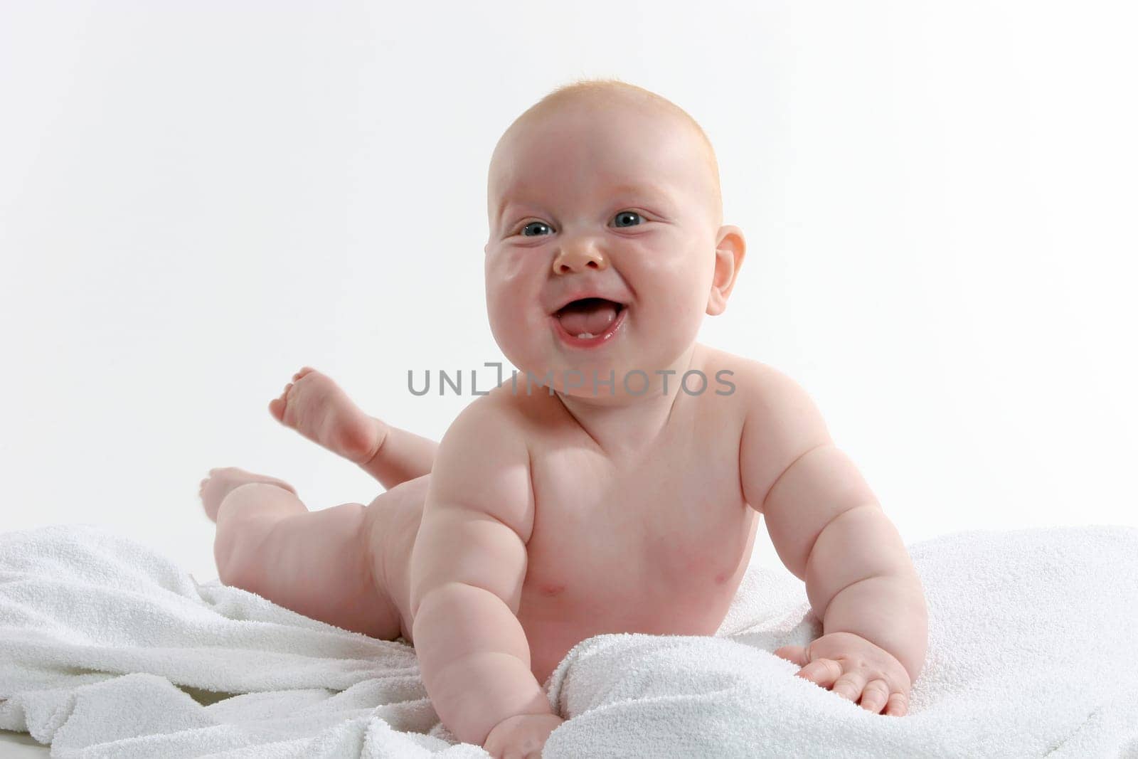 toddler on towel after refreshing bath
