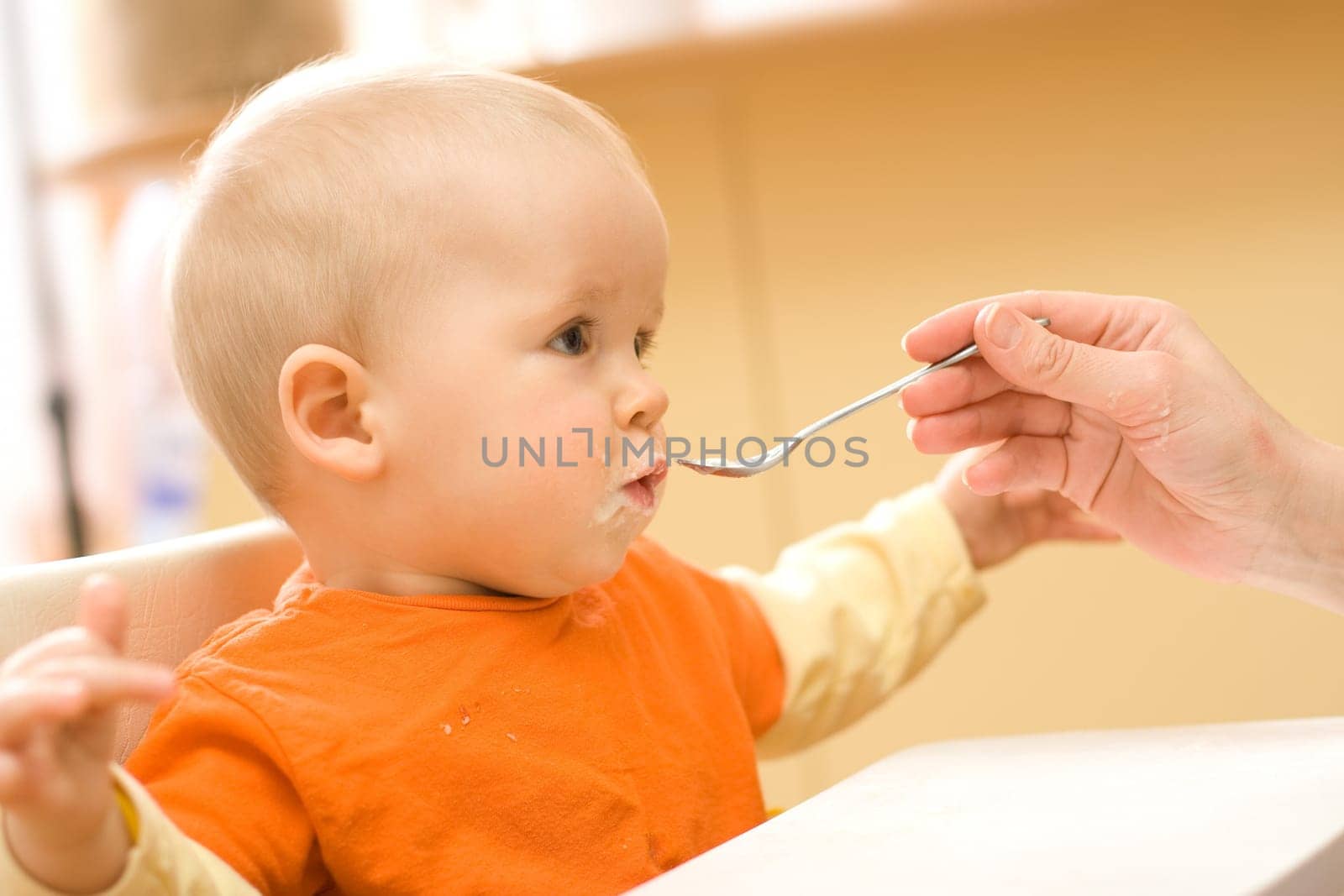 Feeding procedure of a little baby boy