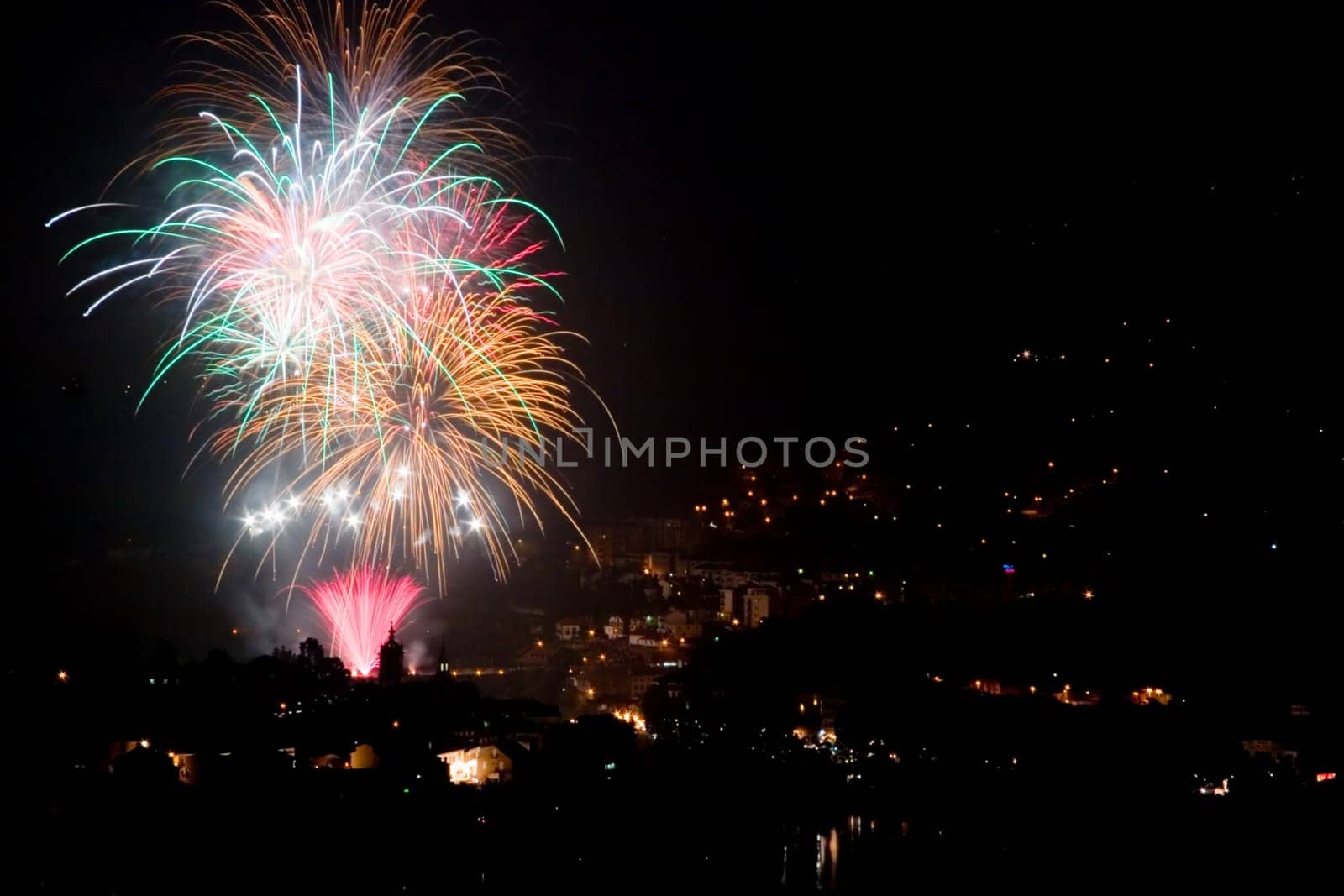Photo of a bright and colorful fireworks display on a holiday.