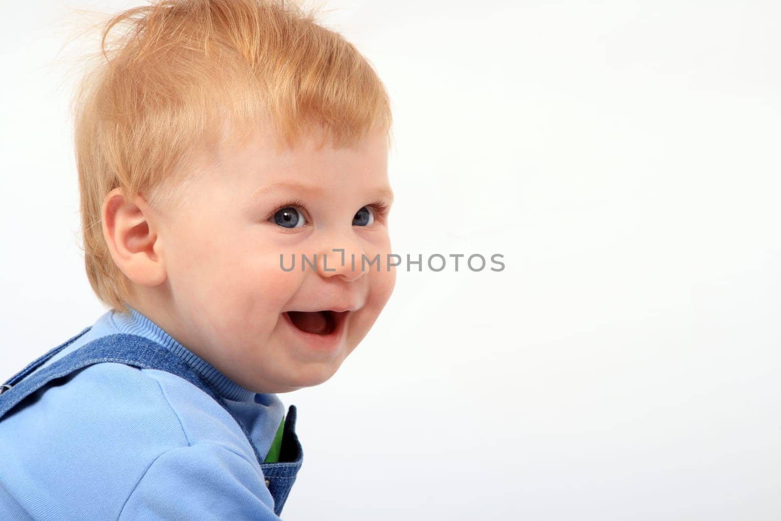 Portrait of the beautiful little boy with emotions