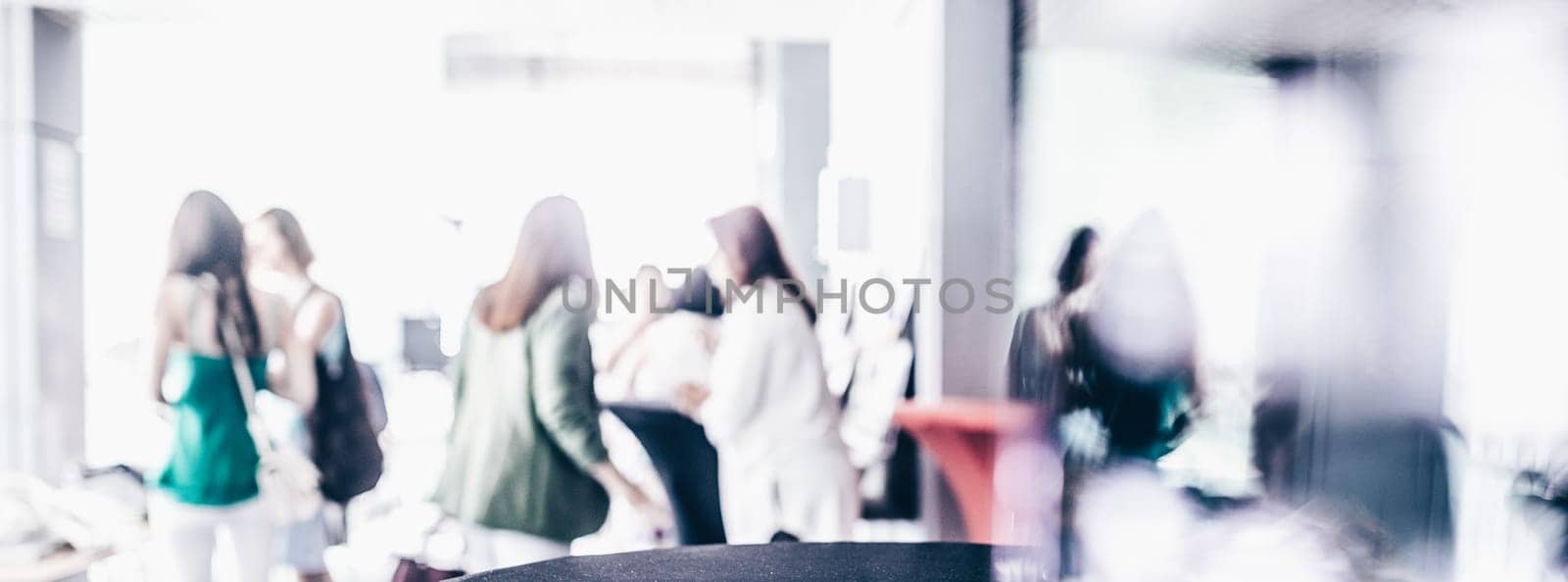 Blured image of businesspeople at coffee break at conference meeting. Business and entrepreneurship.