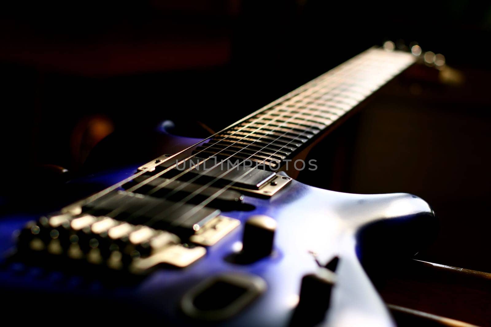 guitar head strings macro on black