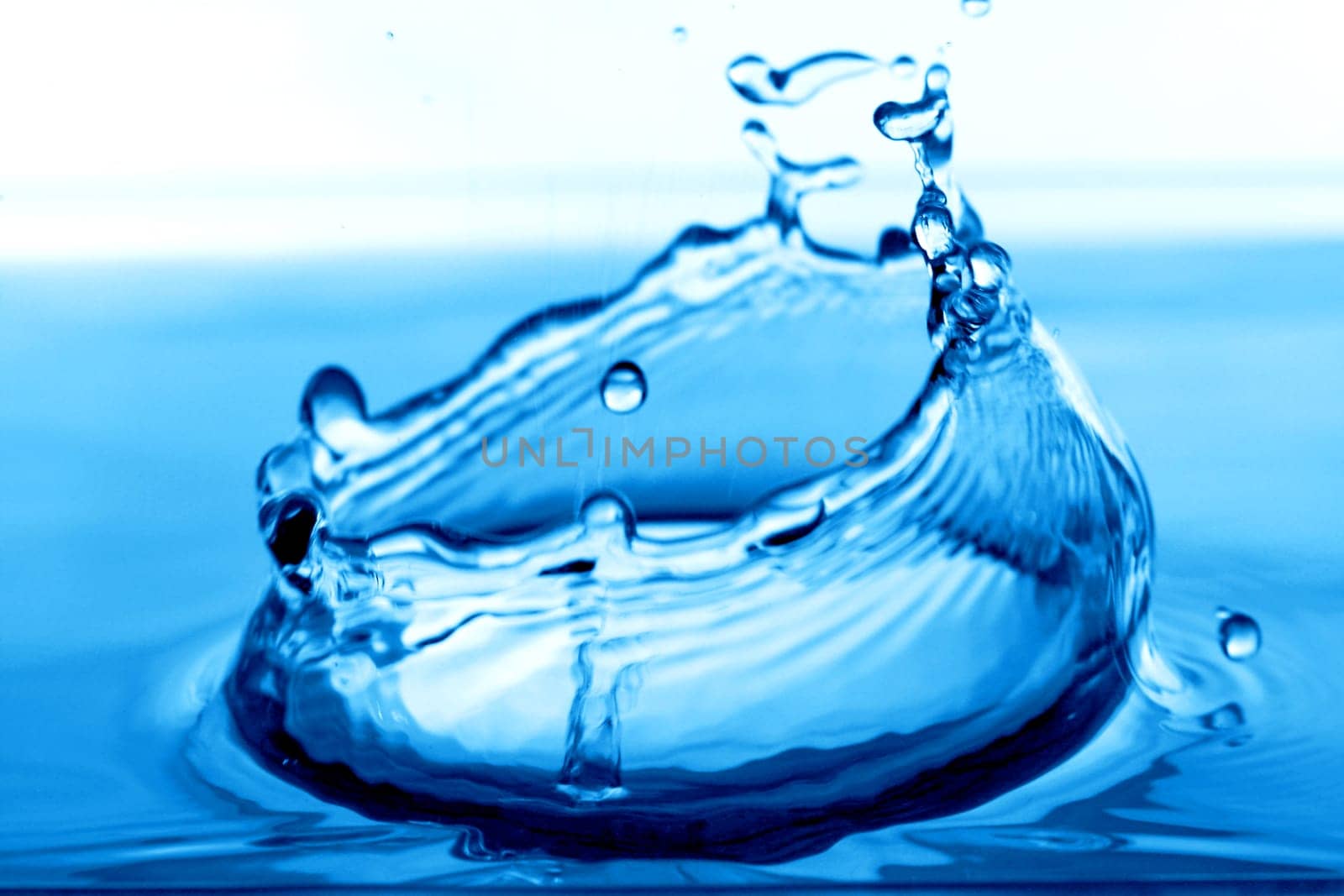 blue water splash macro close up