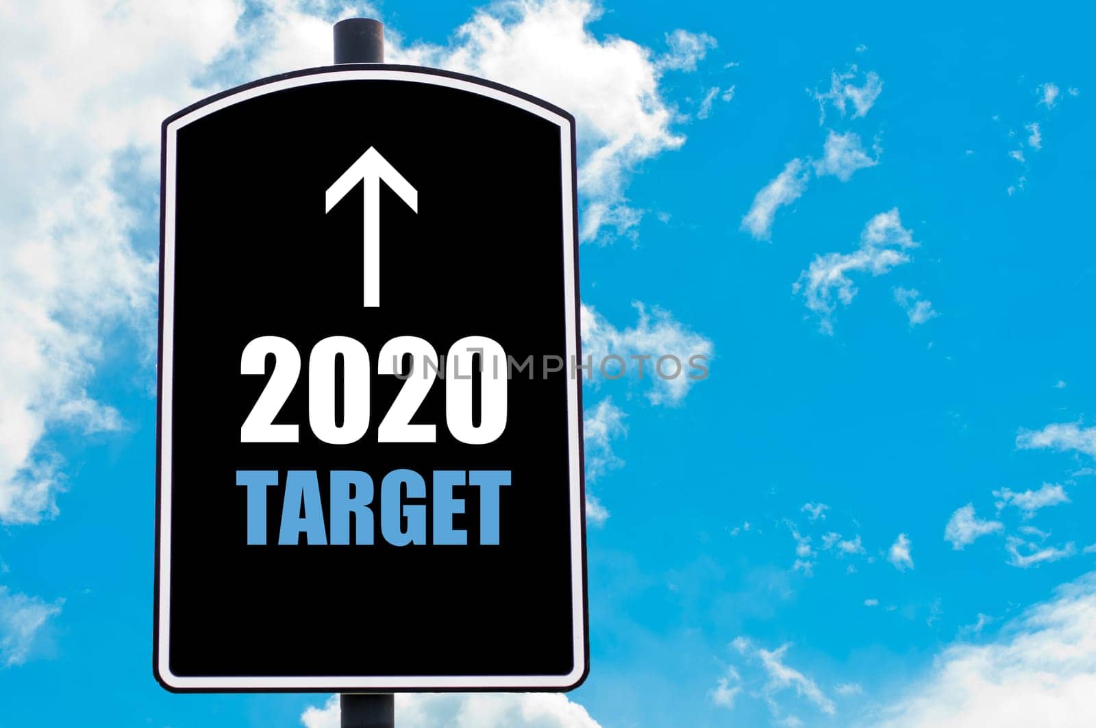 TWENTY TWENTY TARGET AHEAD motivational quote written on road sign isolated over clear blue sky background with available copy space. Concept  image