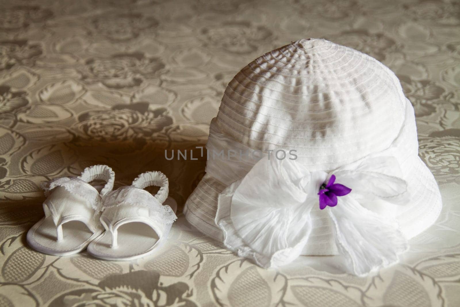 Close-up of accessories for babies christening