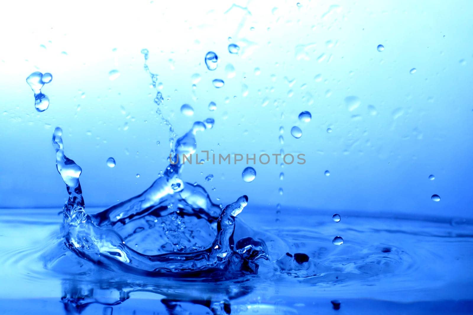 great blue water splash close up macro