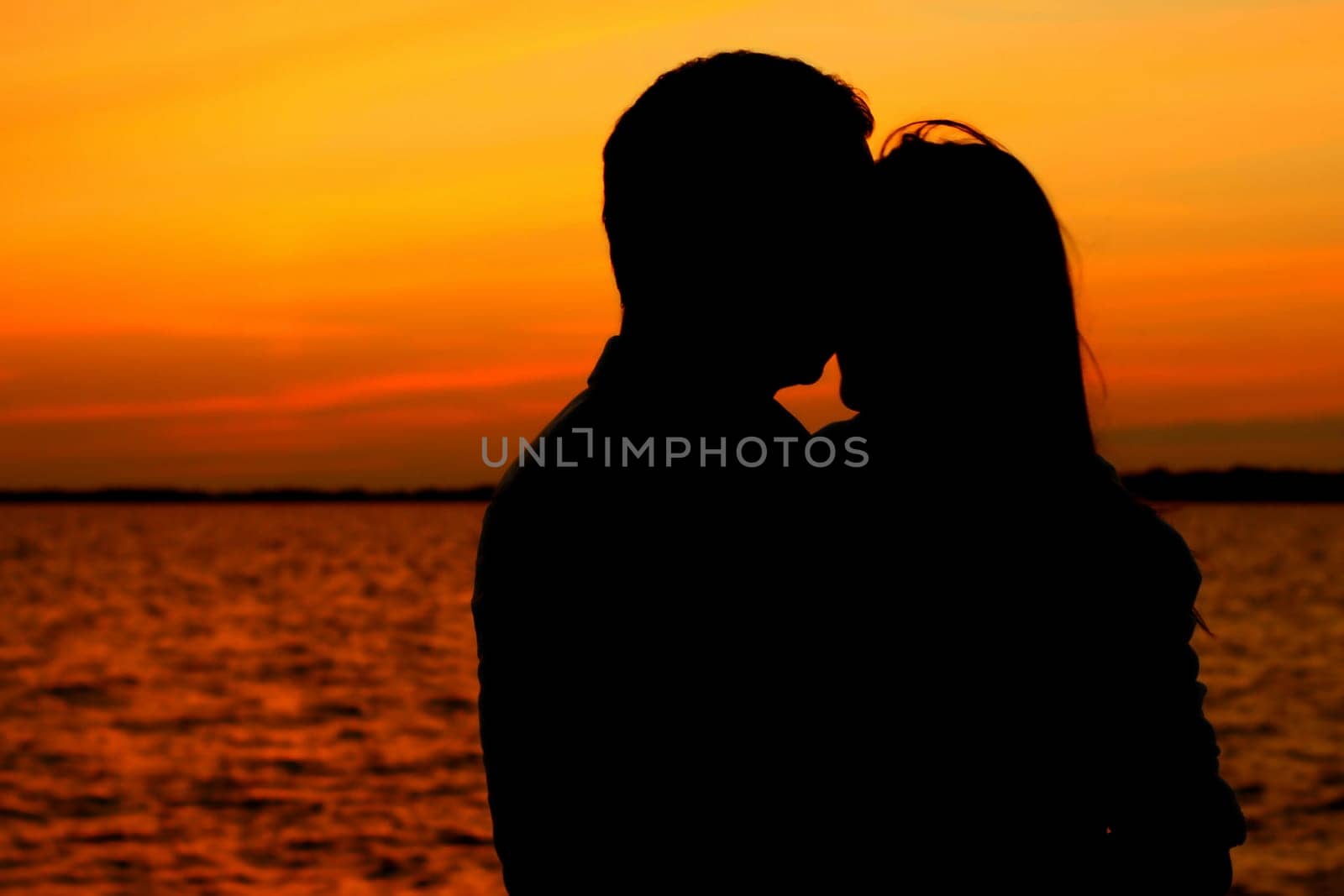 relax on gold sunset  romance flirt of two person on vacation