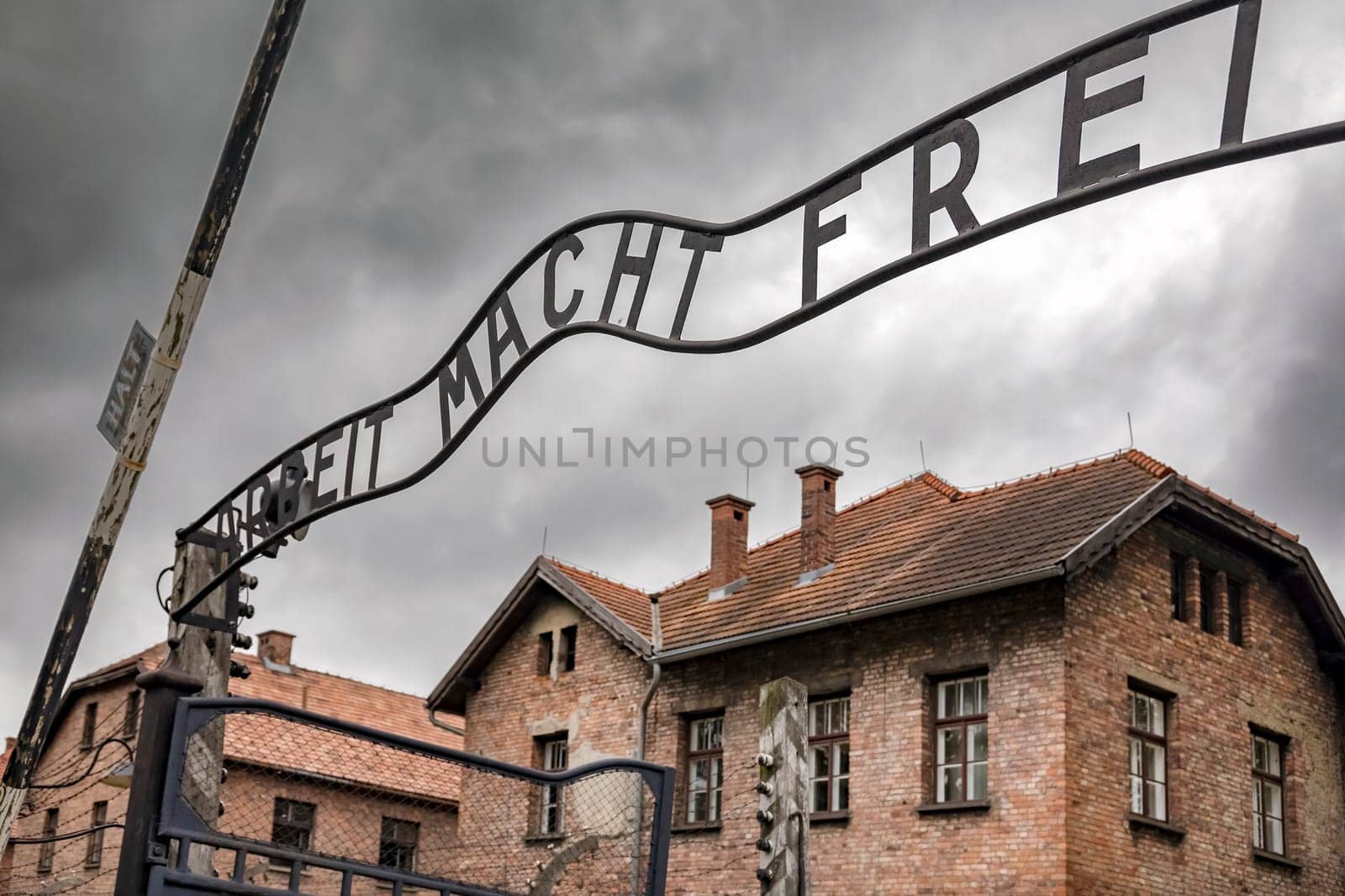 Entrance gate to former German Nazi concentration and extermination camp in Auschwitz in Poland