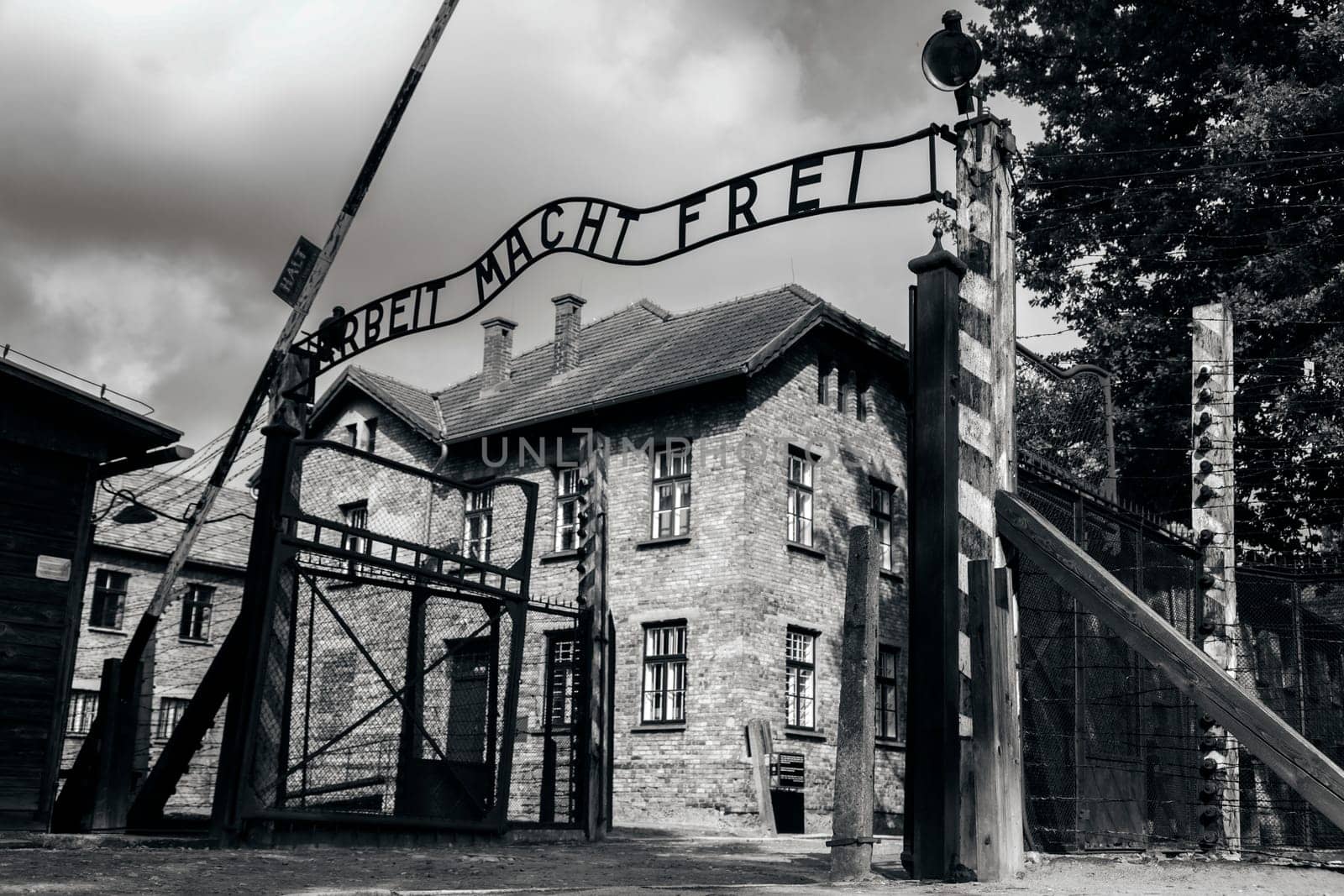Entrance gate to former German Nazi concentration and extermination camp in Auschwitz in Poland