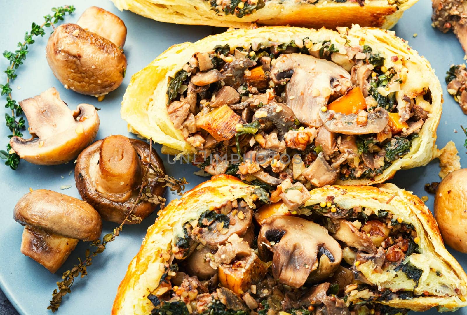 Baked closed mushroom pie, sliced mushroom champignons tart. Wellington pie