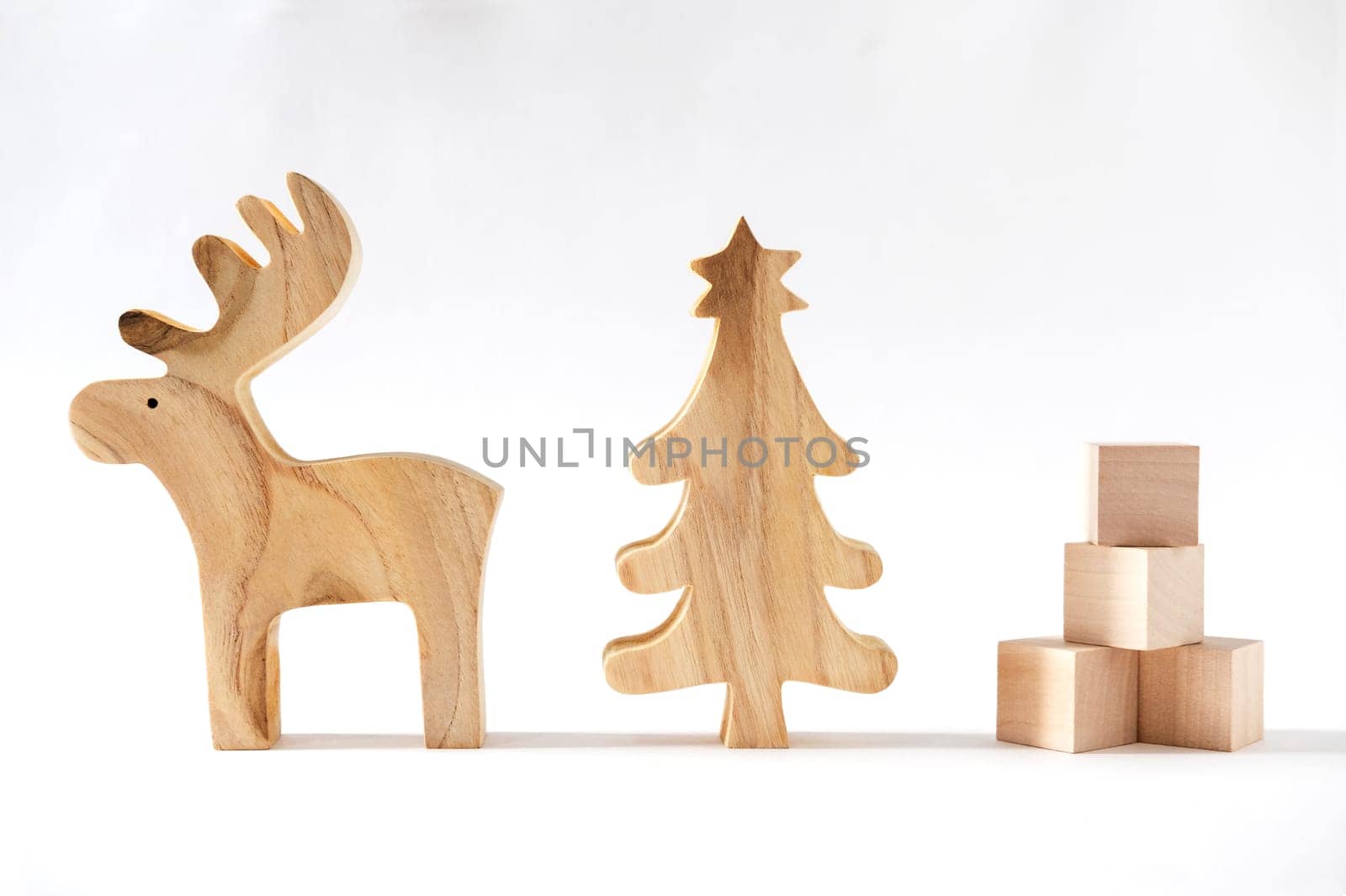 Christmas winter festive ornament. Reindeer, pine tree and gift boxes decoration on white background. Minimal holiday greeting season. Merry Christmas and Happy New Year.