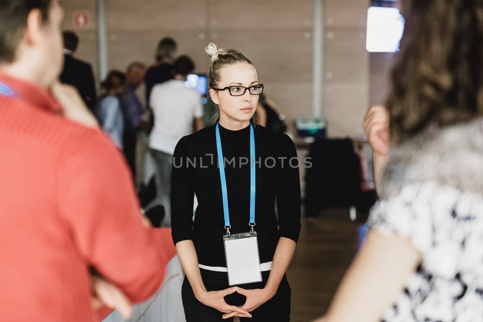 People interacting during coffee break at medical or scientific conference.