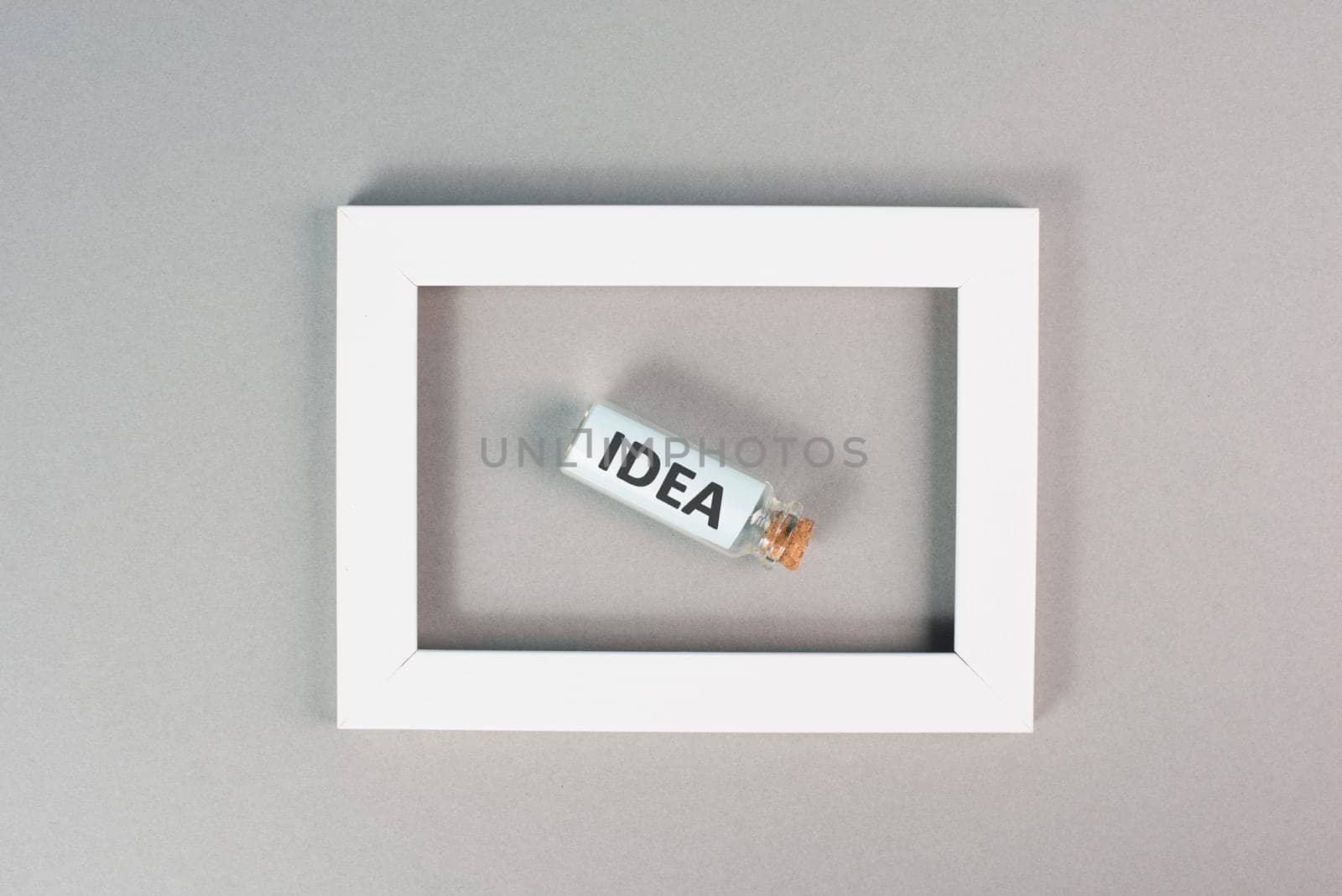 Idea is standing in the glass bottle in the frame, brainstorming concept, solving a problem, starting a business