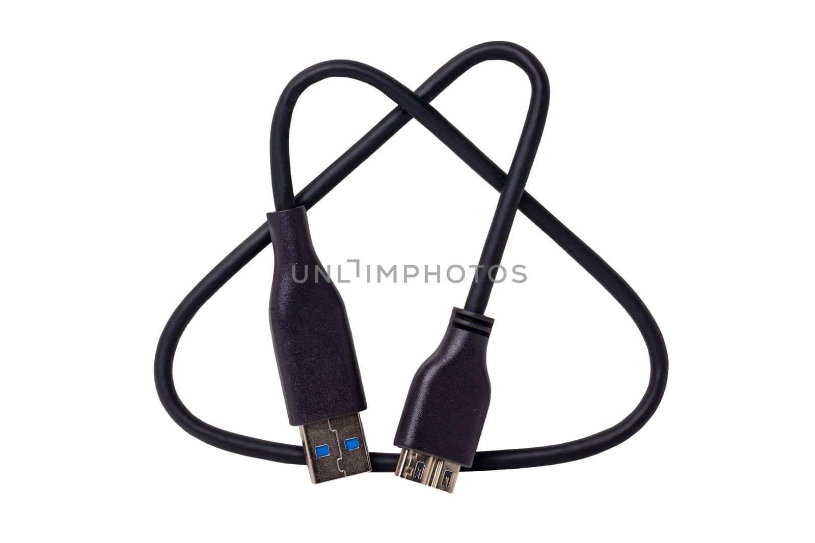 Black Micro USB cable to connect laptop to external hard drives for backup up files isolated on a white background. Clipping path. Macro.