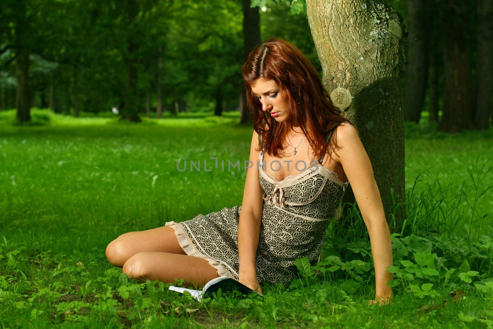 beautiful student girl in the green park