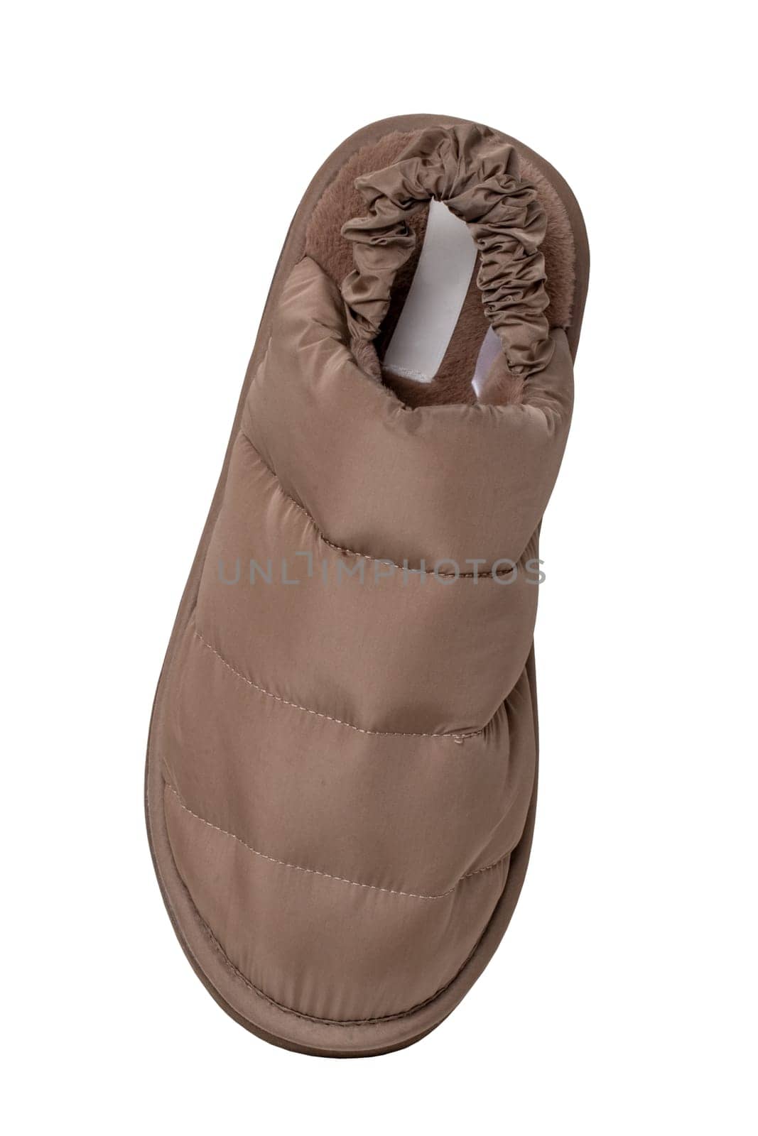 Slippers isolated. Close-up of a single of female brown warm and soft cosy terry house slipper isolated on white background.  Womans shoes. Macro.