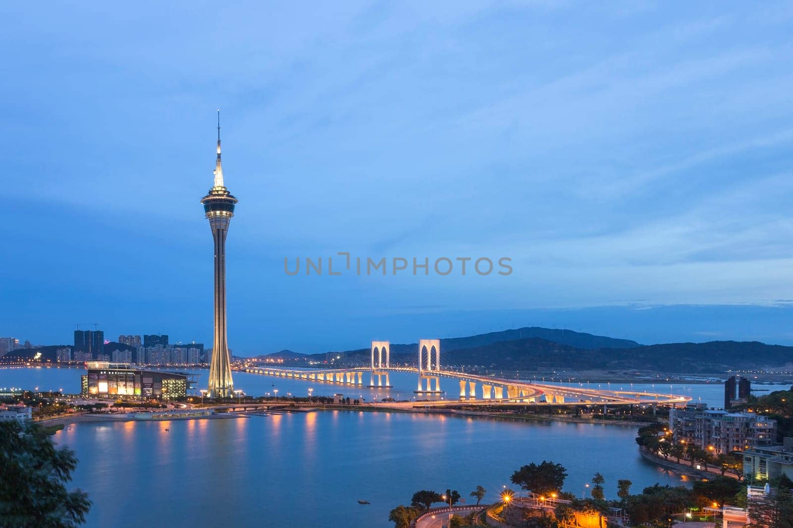 Macau Tower and Ponte de Sai Van bridge, This photo was shot in the evening after sunset.