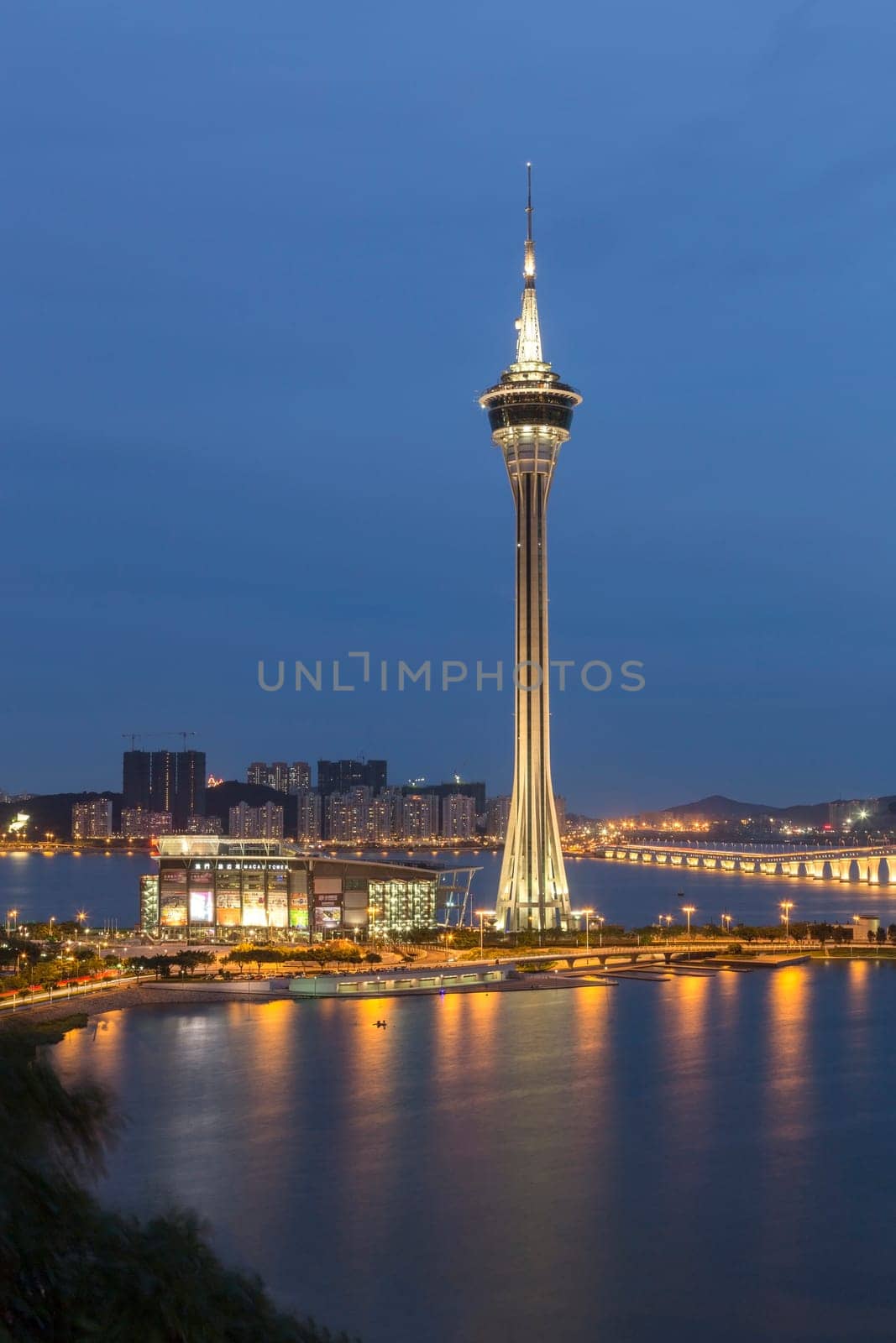 Macau Tower and Ponte de Sai Van bridge, This photo was shot in the evening after sunset.