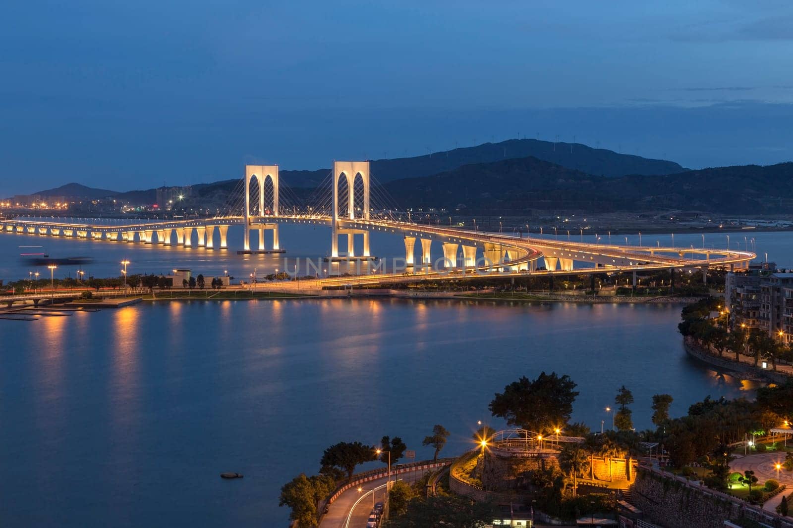 Macau Tower and Ponte de Sai Van bridge, This photo was shot in the evening after sunset.