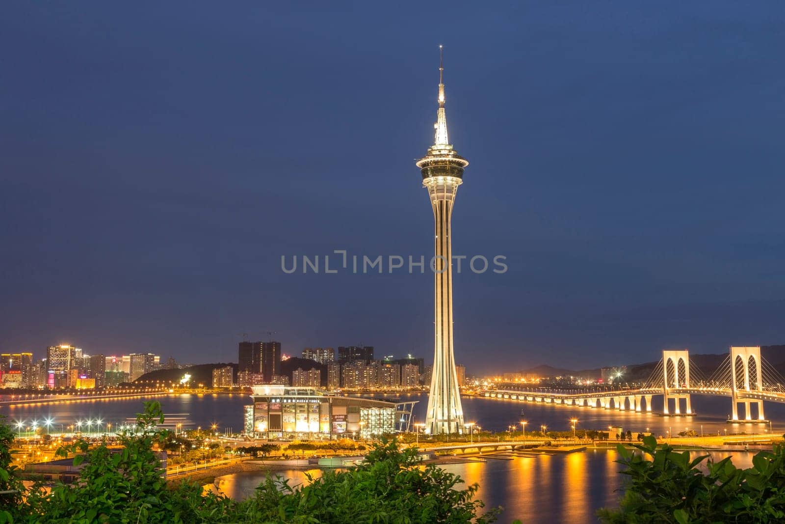 Macau Tower and Ponte de Sai Van bridge, This photo was shot in the evening after sunset.