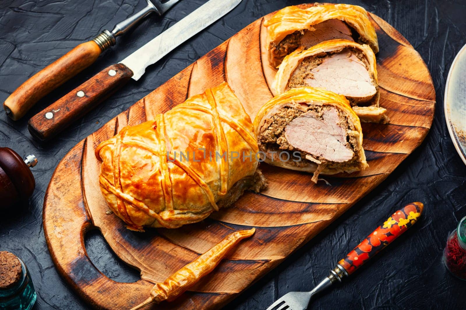 Popular delicious meat food is wellington meat, meat wrapped in dough. British food