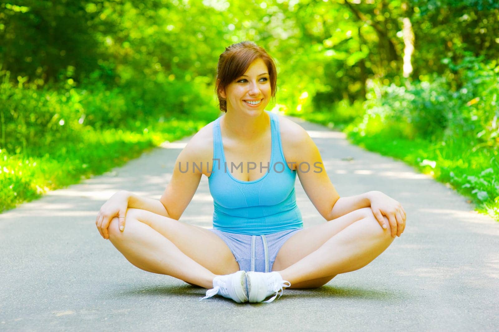 Young woman exercising, from a complete series of photos.