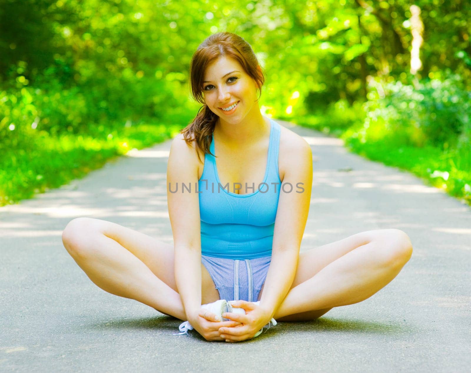 Young woman exercising, from a complete series of photos.