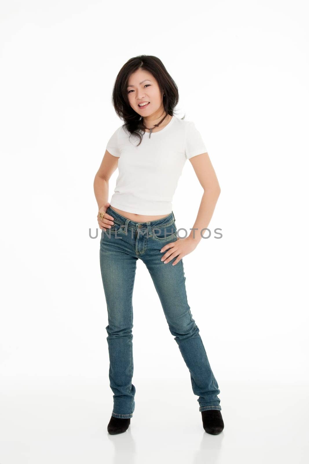 Beautiful Asian woman posing on a white background