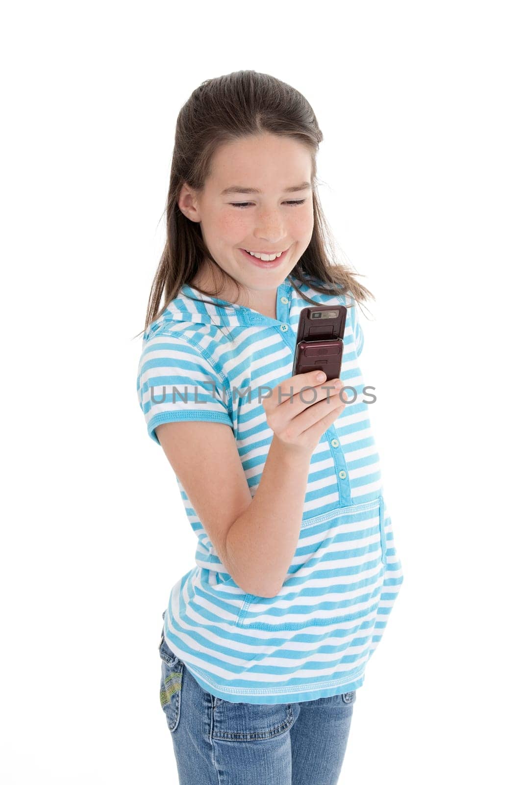 Cute Caucasian girls texting on a cell phone