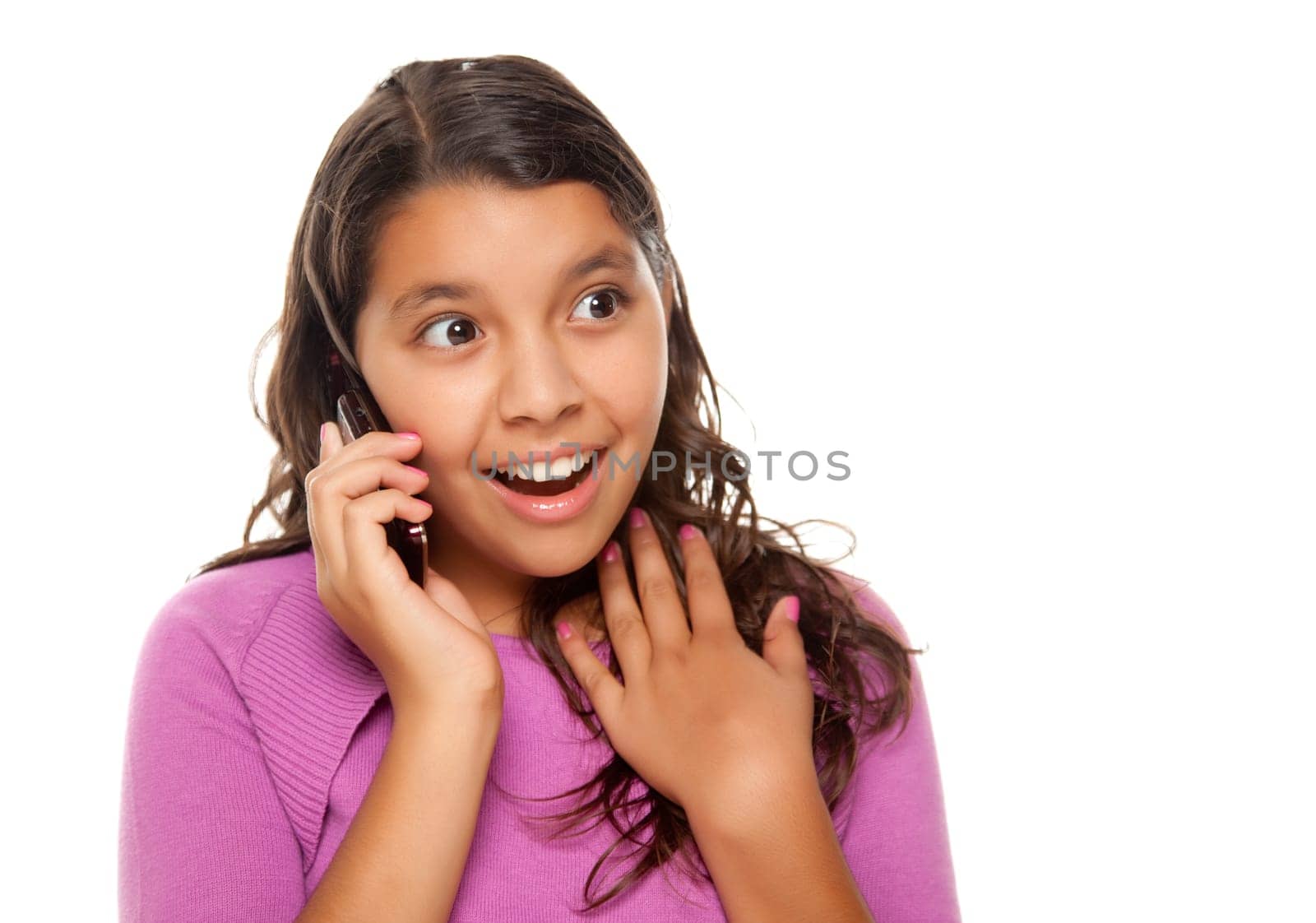 Shocked Pretty Hispanic Girl On Cell Phone Isolated on a White Background.