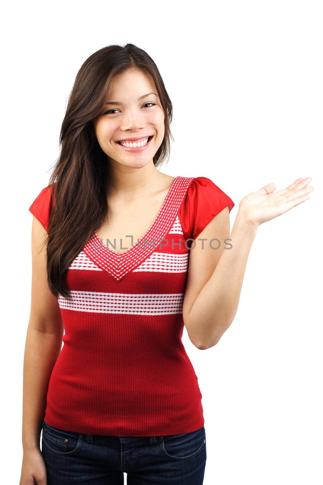 Beautiful young eurasian woman presenting your product. Isolated on white background.
