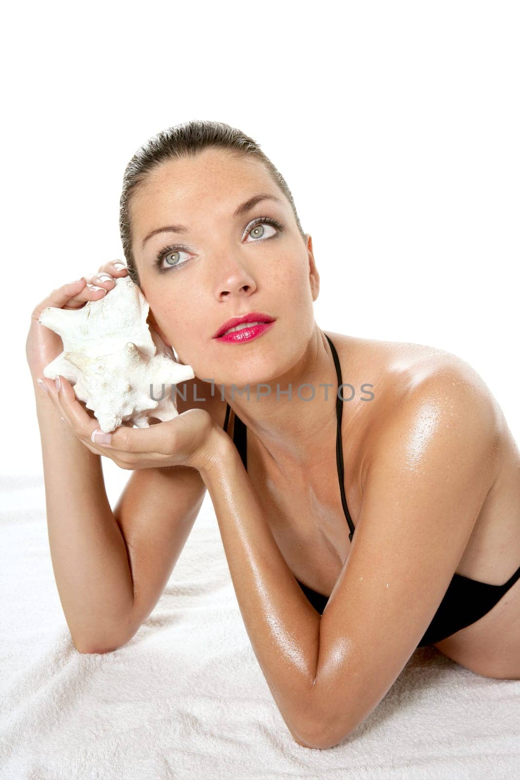 Beautiful bikini red lips elegant woman hearing winkle at studio
