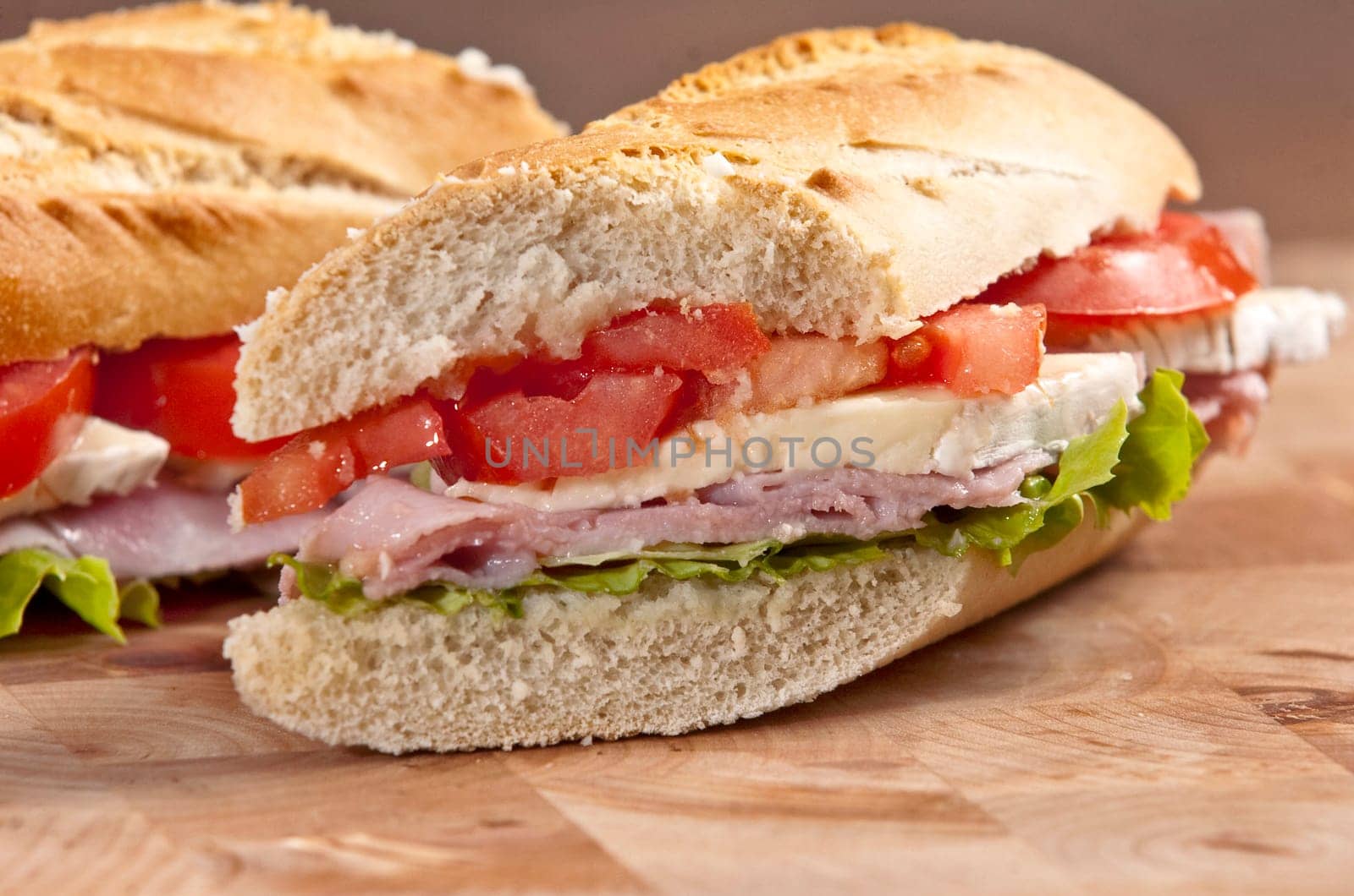 rustic french baguete with ham and cheese
